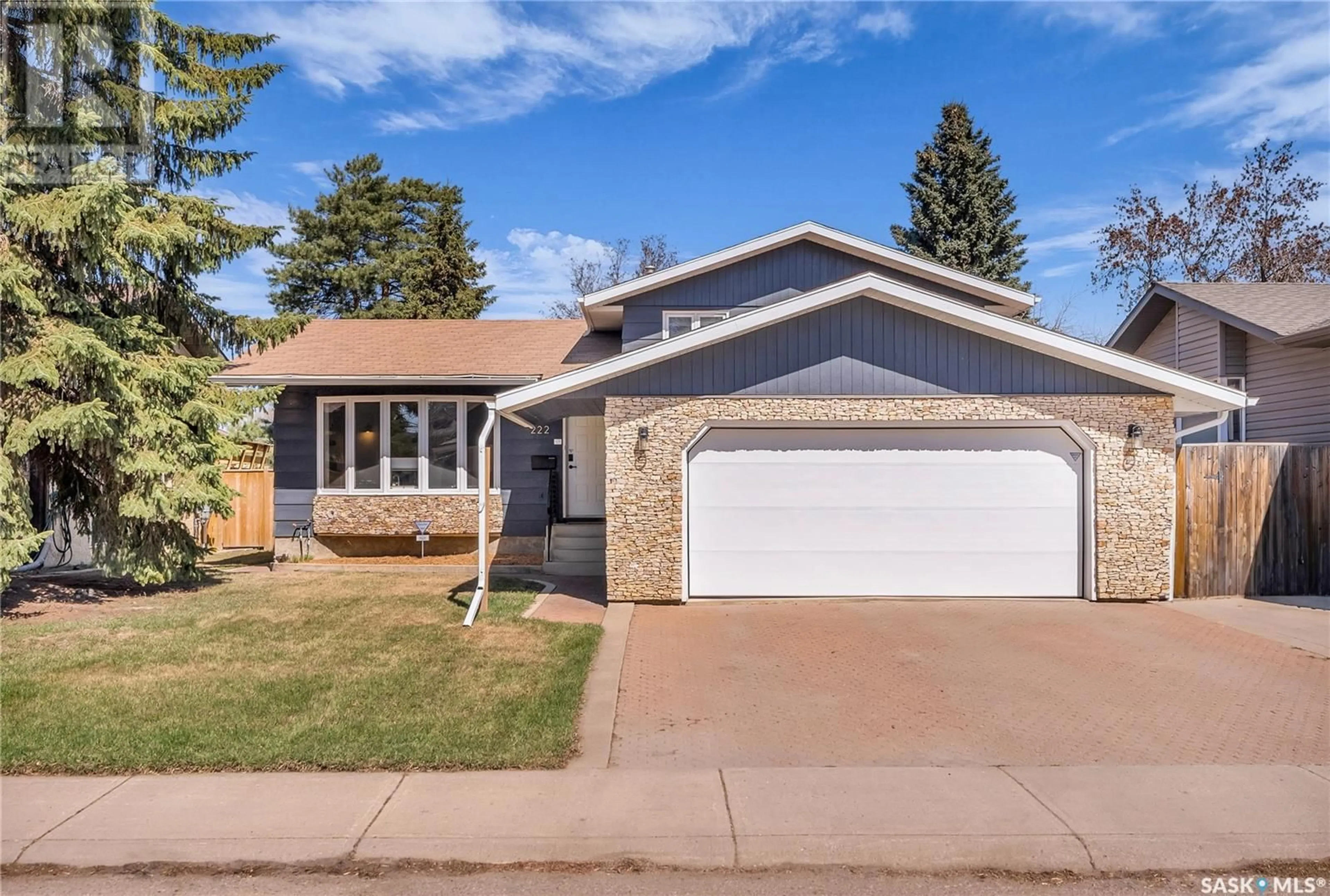 Home with vinyl exterior material, street for 222 MOLLOY STREET, Saskatoon Saskatchewan S7K6N5