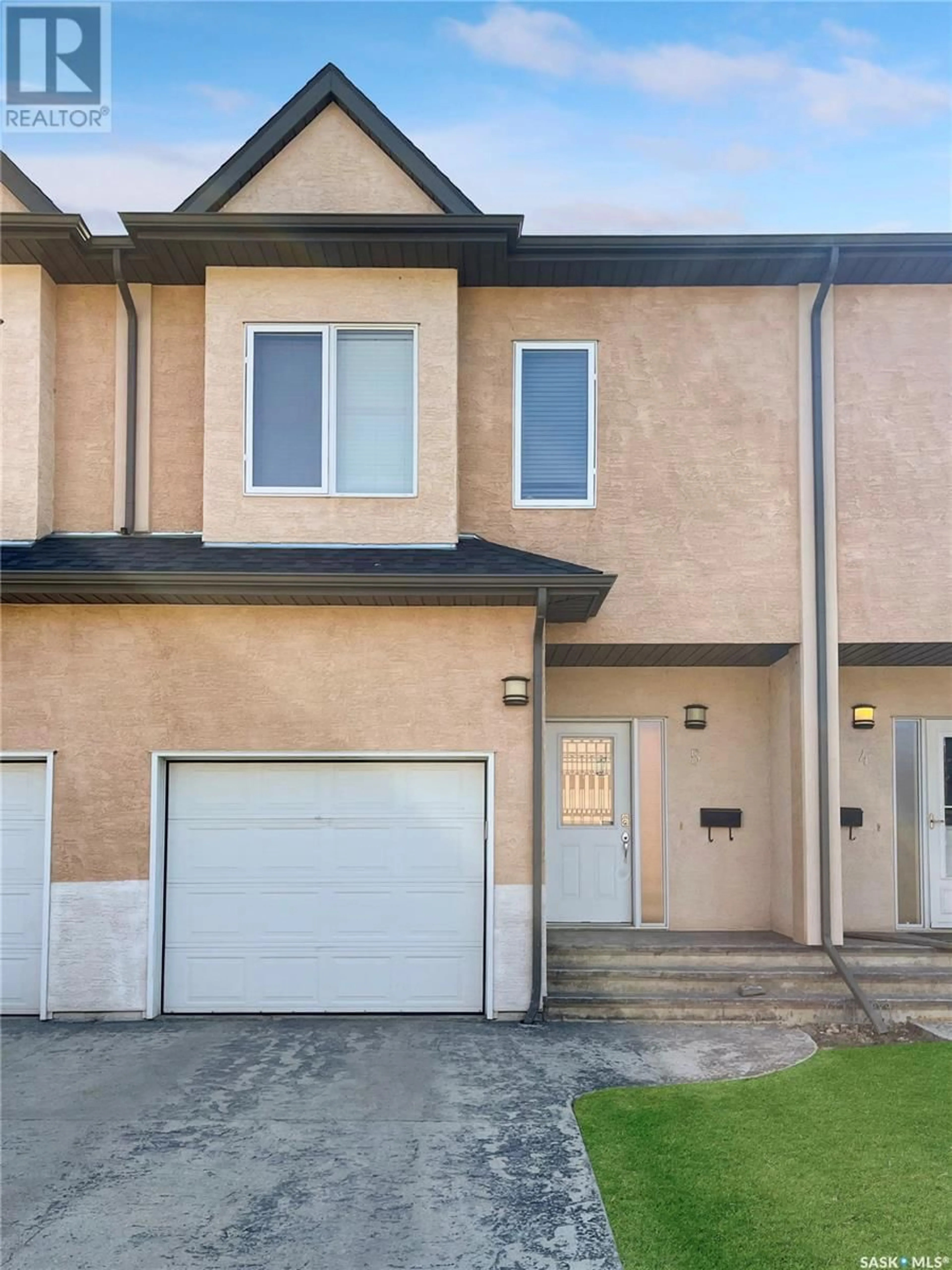 Home with vinyl exterior material, street for E - 5701 MCINTOSH STREET, Swift Current Saskatchewan S9H1H7