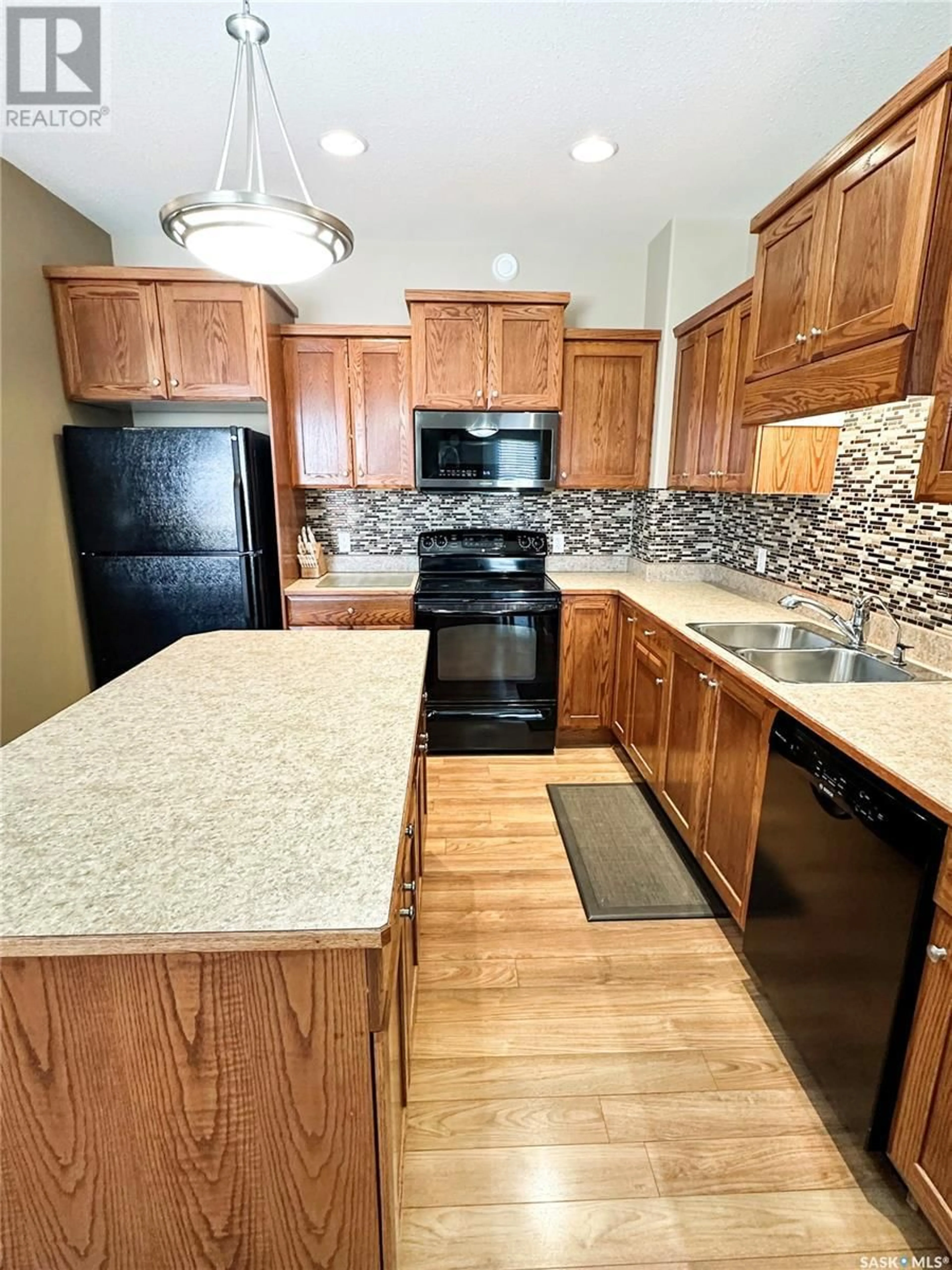 Standard kitchen, ceramic/tile floor for E - 5701 MCINTOSH STREET, Swift Current Saskatchewan S9H1H7