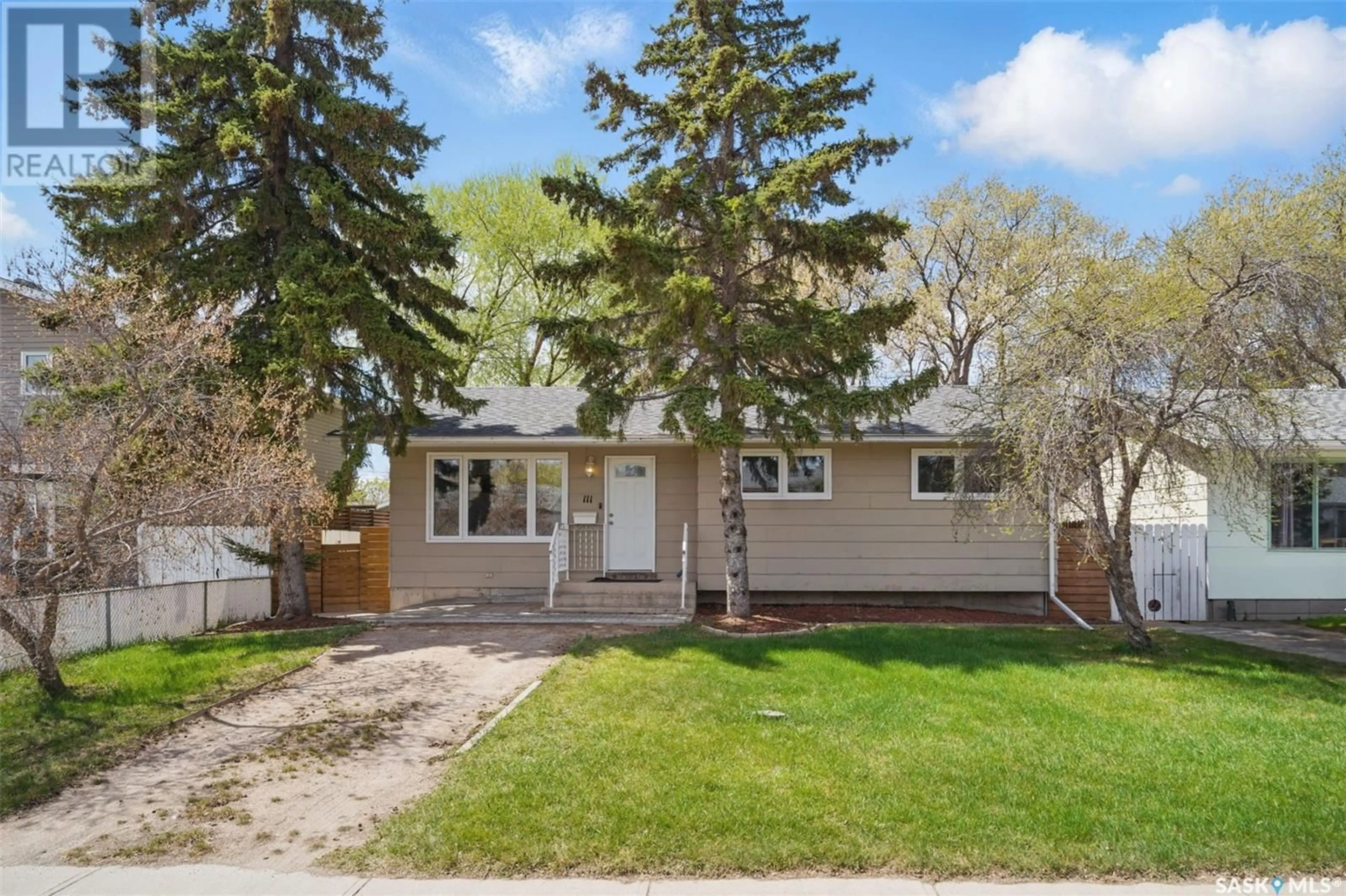 Home with vinyl exterior material, street for 111 5TH AVENUE, Warman Saskatchewan S0K4S0