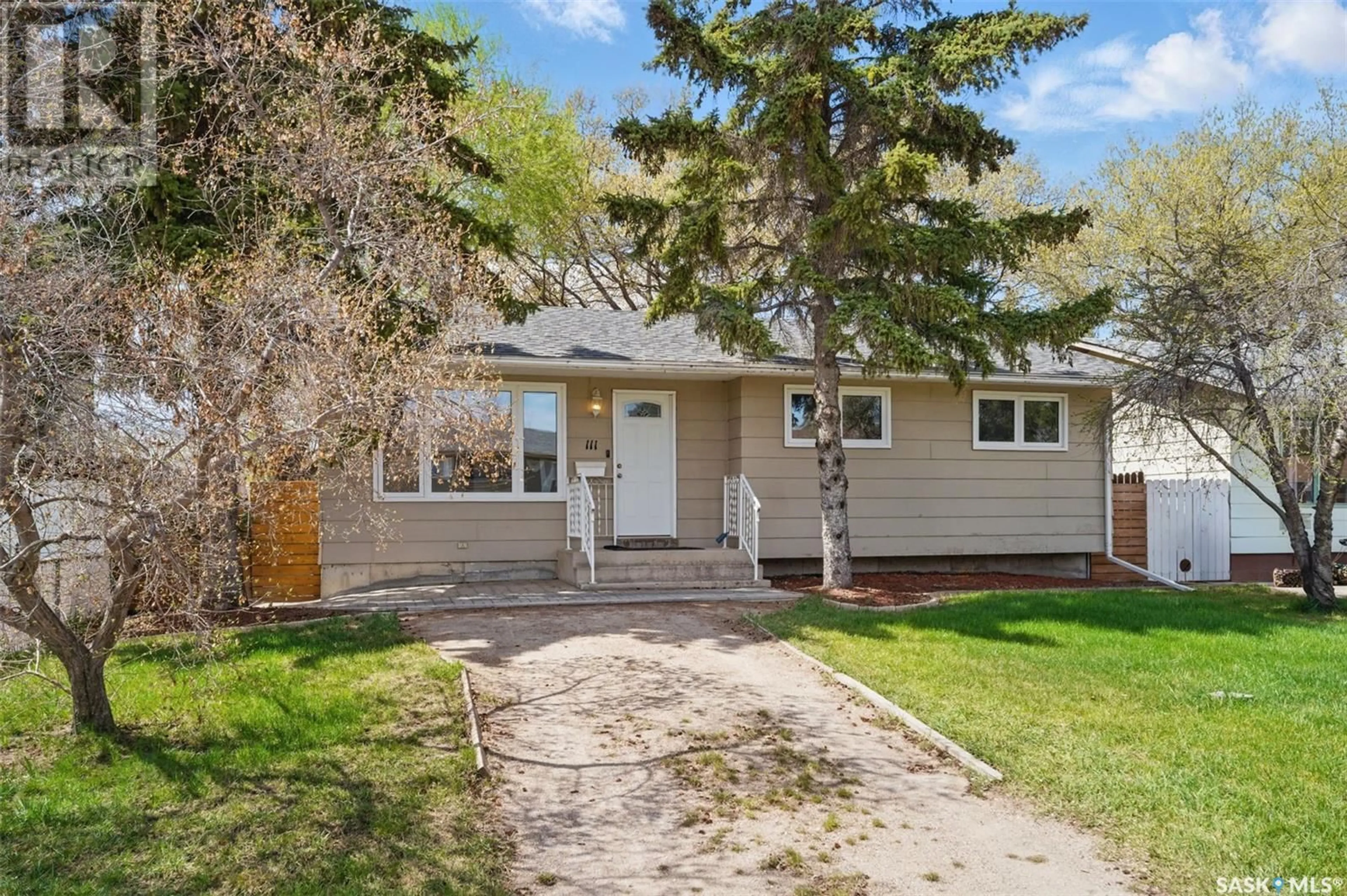 Home with vinyl exterior material, street for 111 5TH AVENUE, Warman Saskatchewan S0K4S0