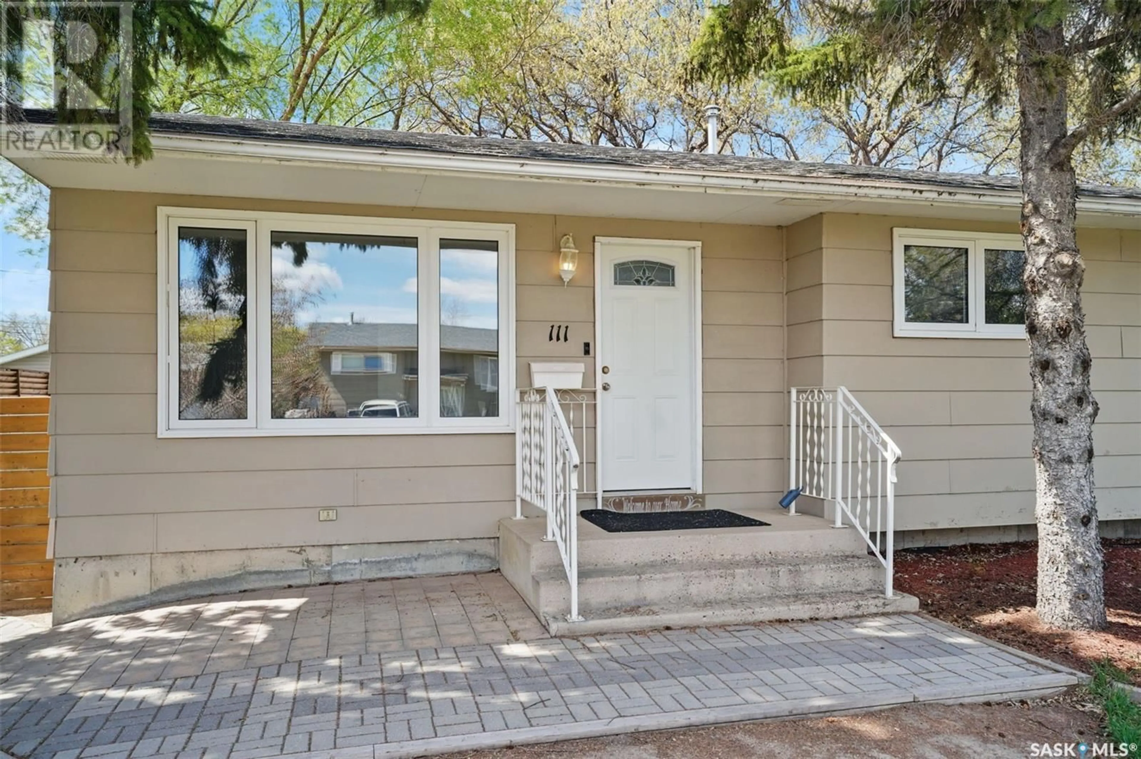 Home with vinyl exterior material, street for 111 5TH AVENUE, Warman Saskatchewan S0K4S0