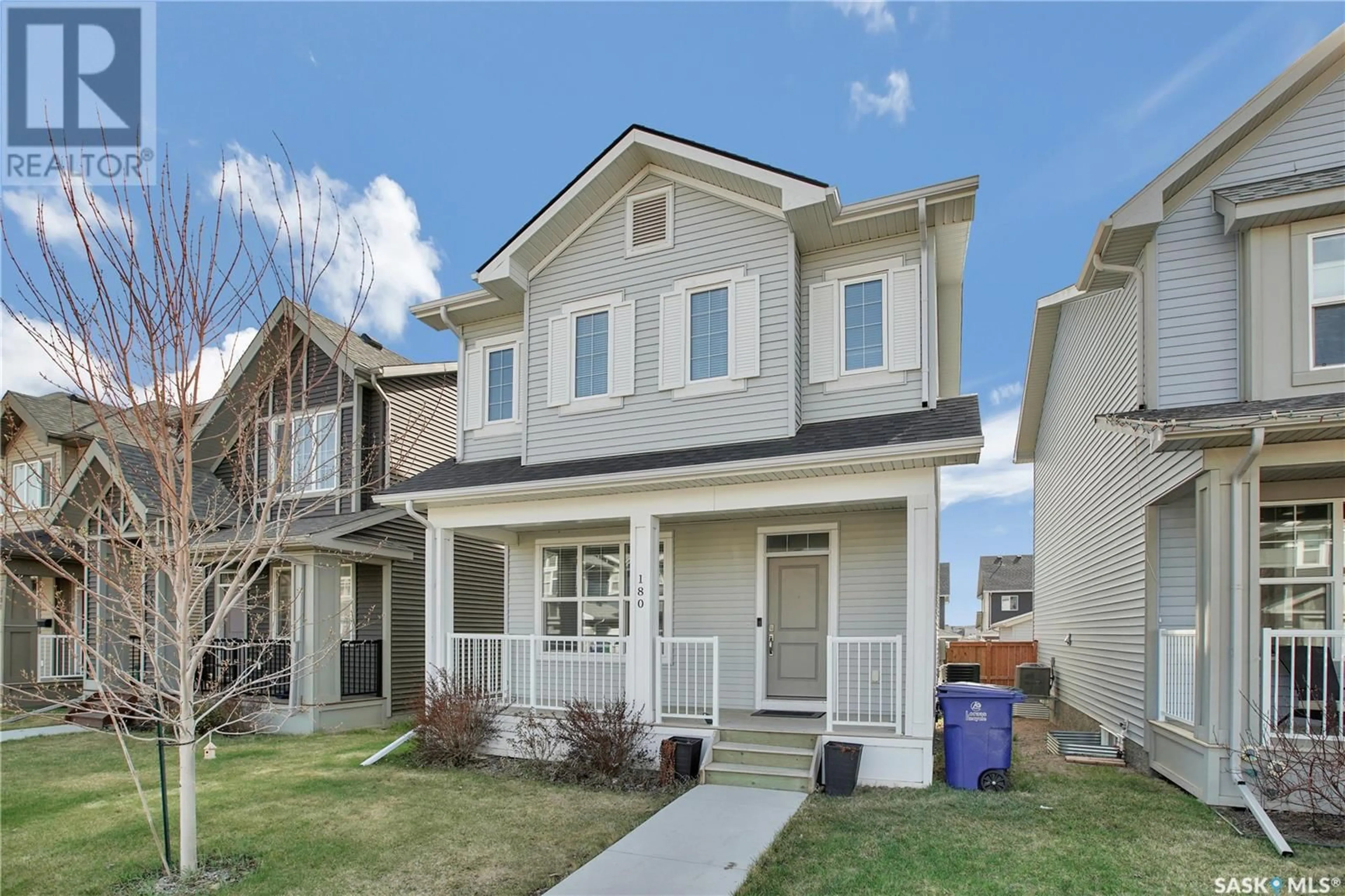 Home with vinyl exterior material, street for 180 DUBOIS CRESCENT, Saskatoon Saskatchewan S7V0R4