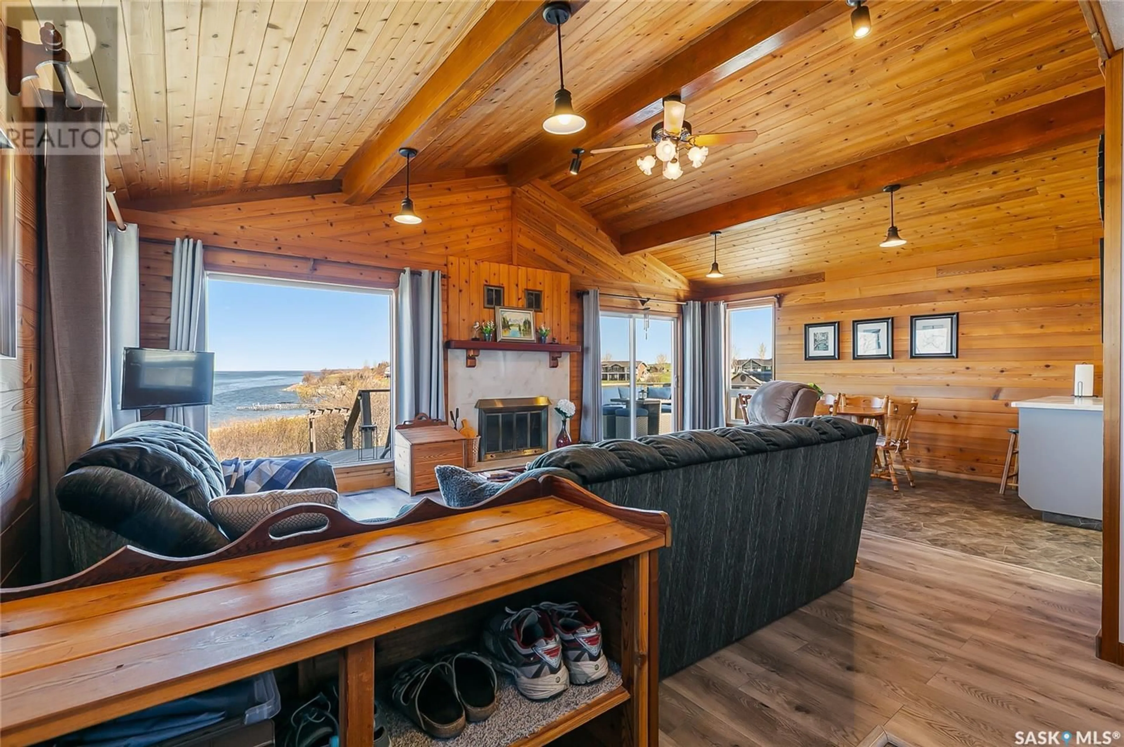 Living room with furniture, wood/laminate floor for 49 MARINA AVENUE, Colesdale Park Saskatchewan S0G0L0