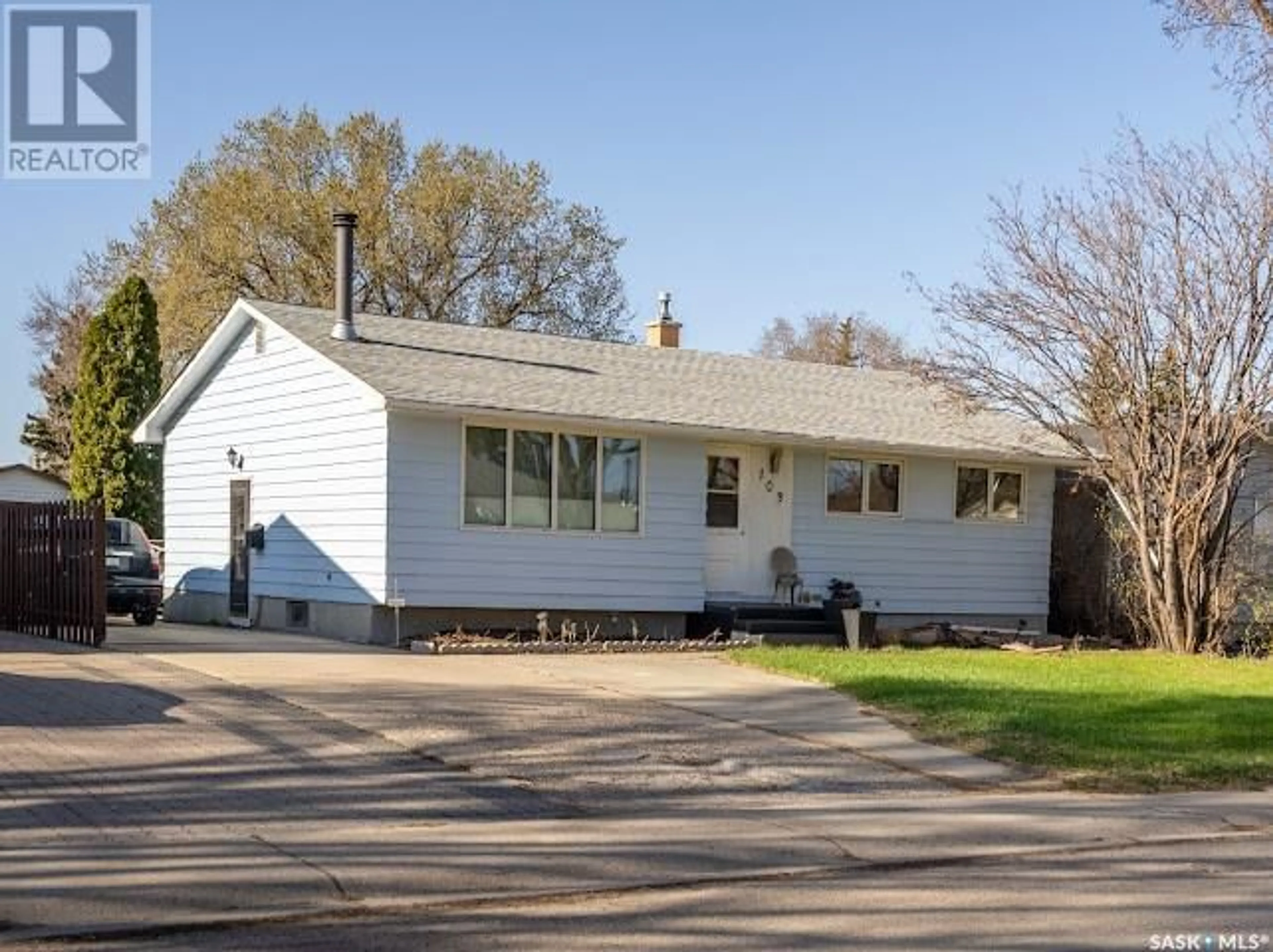 Home with vinyl exterior material, street for 103 ELMVIEW ROAD, Regina Saskatchewan S4R0B5
