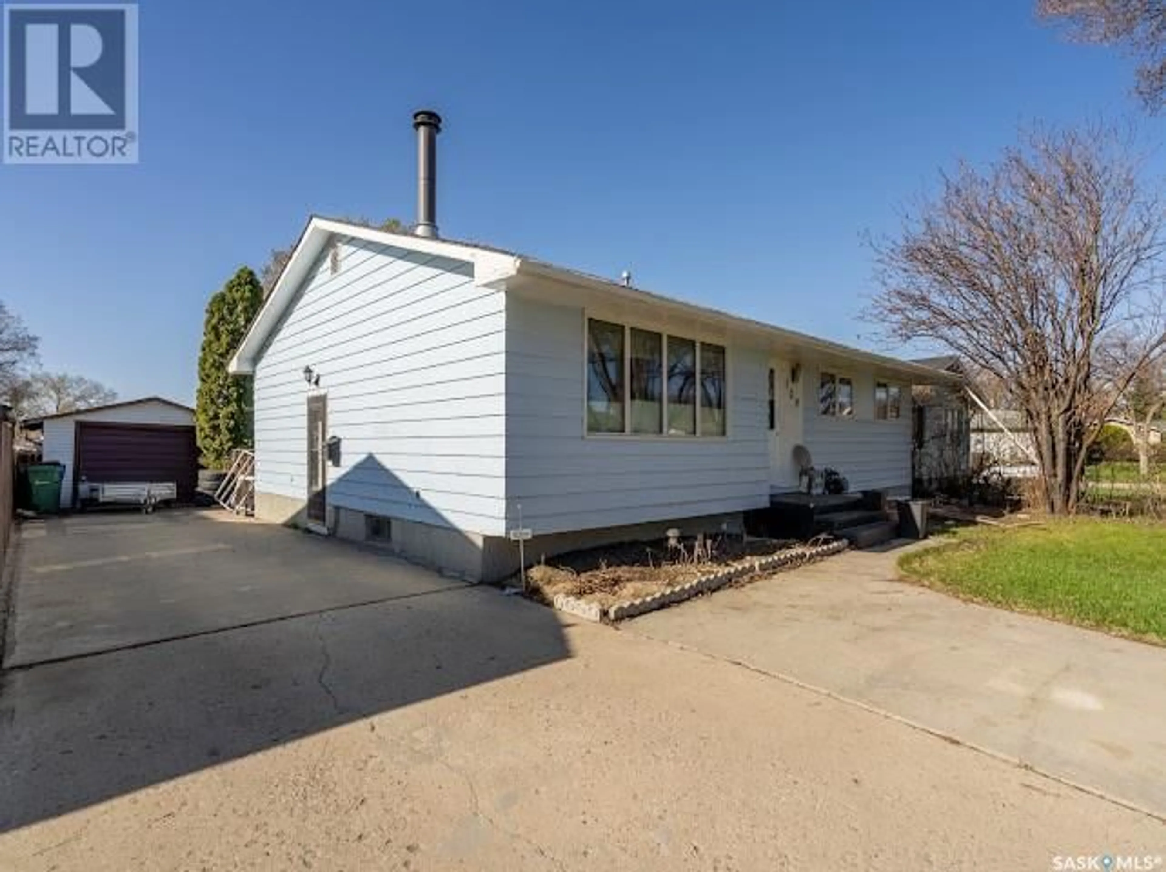 Home with vinyl exterior material, street for 103 ELMVIEW ROAD, Regina Saskatchewan S4R0B5