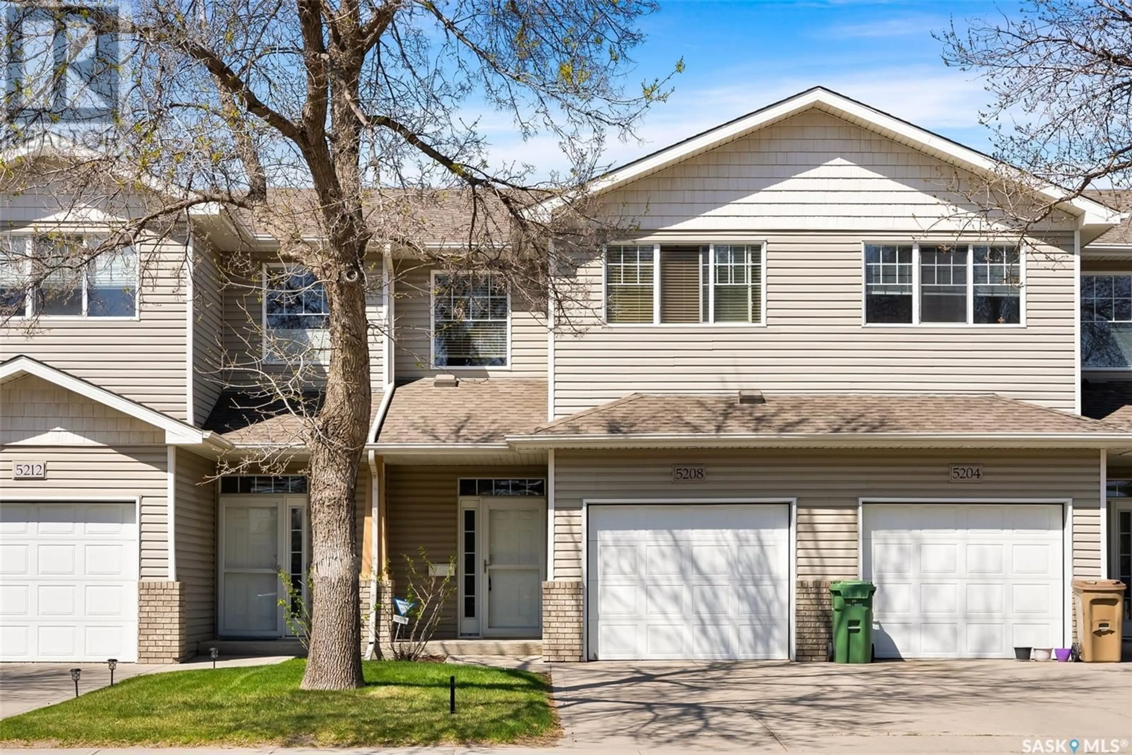 Home with vinyl exterior material, street for 5208 7TH AVENUE, Regina Saskatchewan S4R0K8
