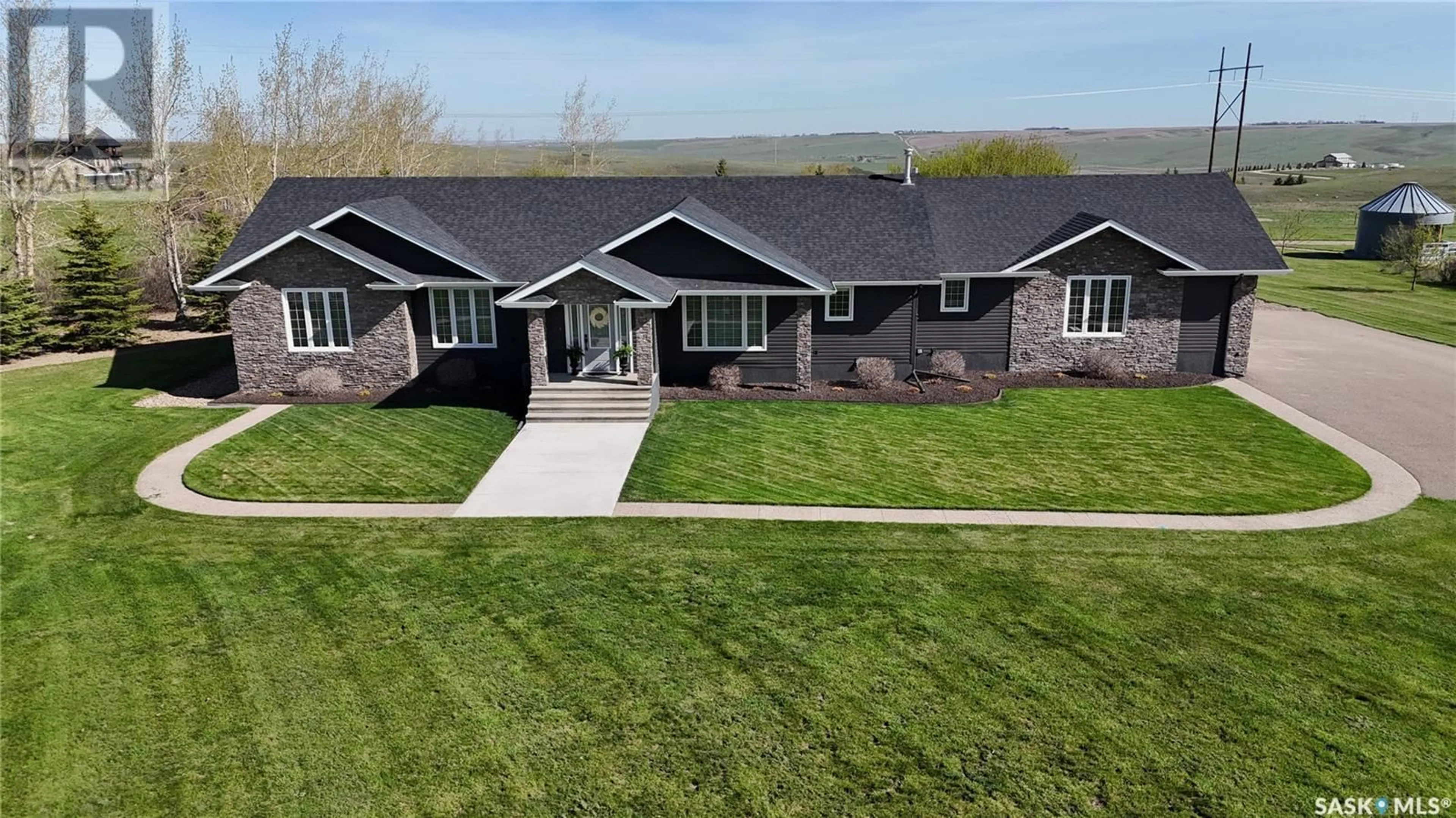 A pic from outside/outdoor area/front of a property/back of a property/a pic from drone, street for GERING ACREAGE, Swift Current Rm No. 137 Saskatchewan S9H3X1