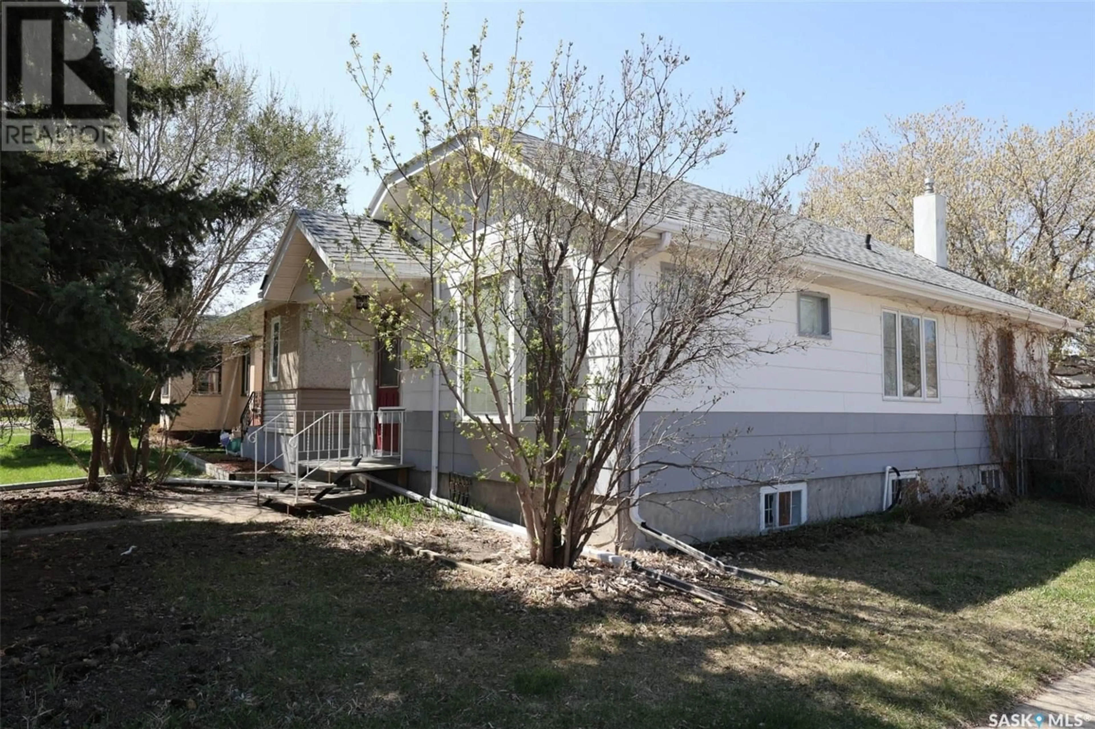 Home with vinyl exterior material, street for 2300 REYNOLDS STREET, Regina Saskatchewan S4N3N5