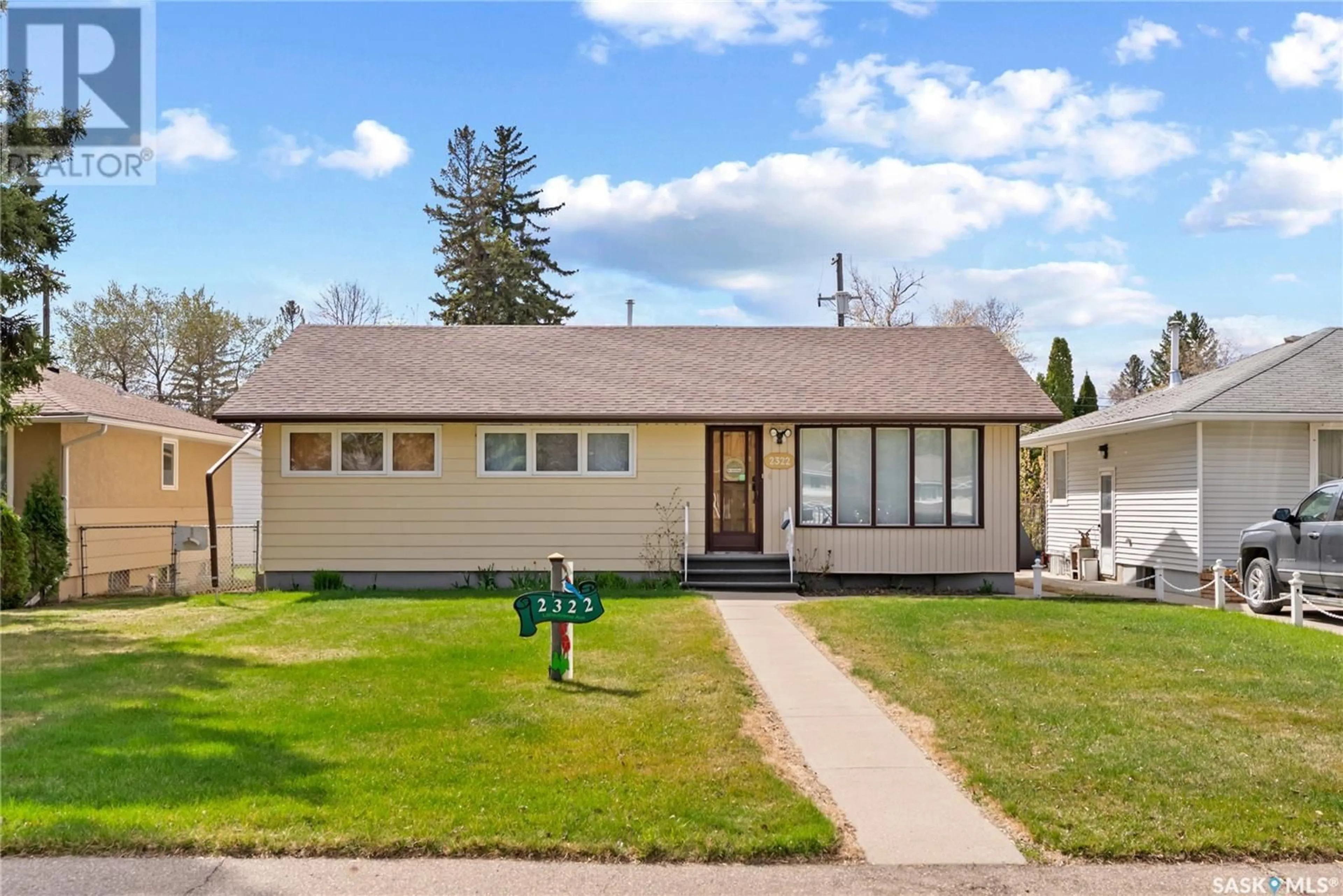Home with vinyl exterior material, street for 2322 LANSDOWNE AVENUE, Saskatoon Saskatchewan S7J1G9