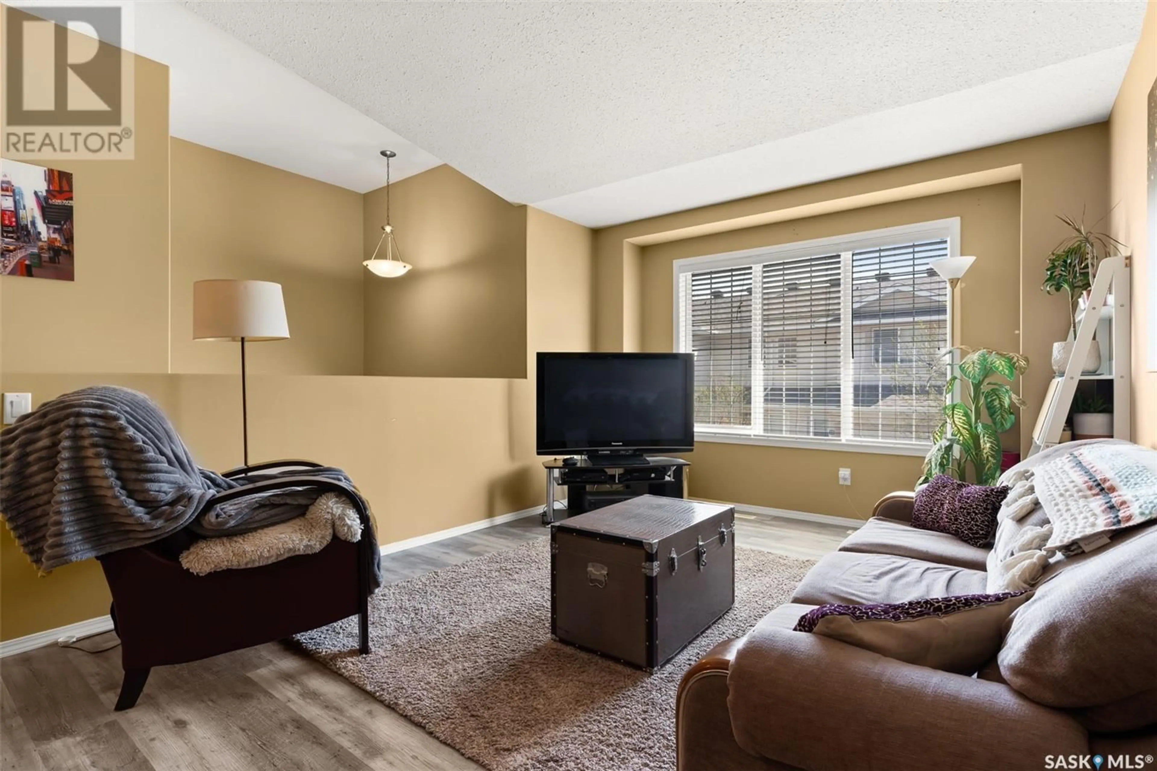 Living room with furniture, unknown for 2801 - 39 WINDSOR PARK ROAD, Regina Saskatchewan S4V0N1