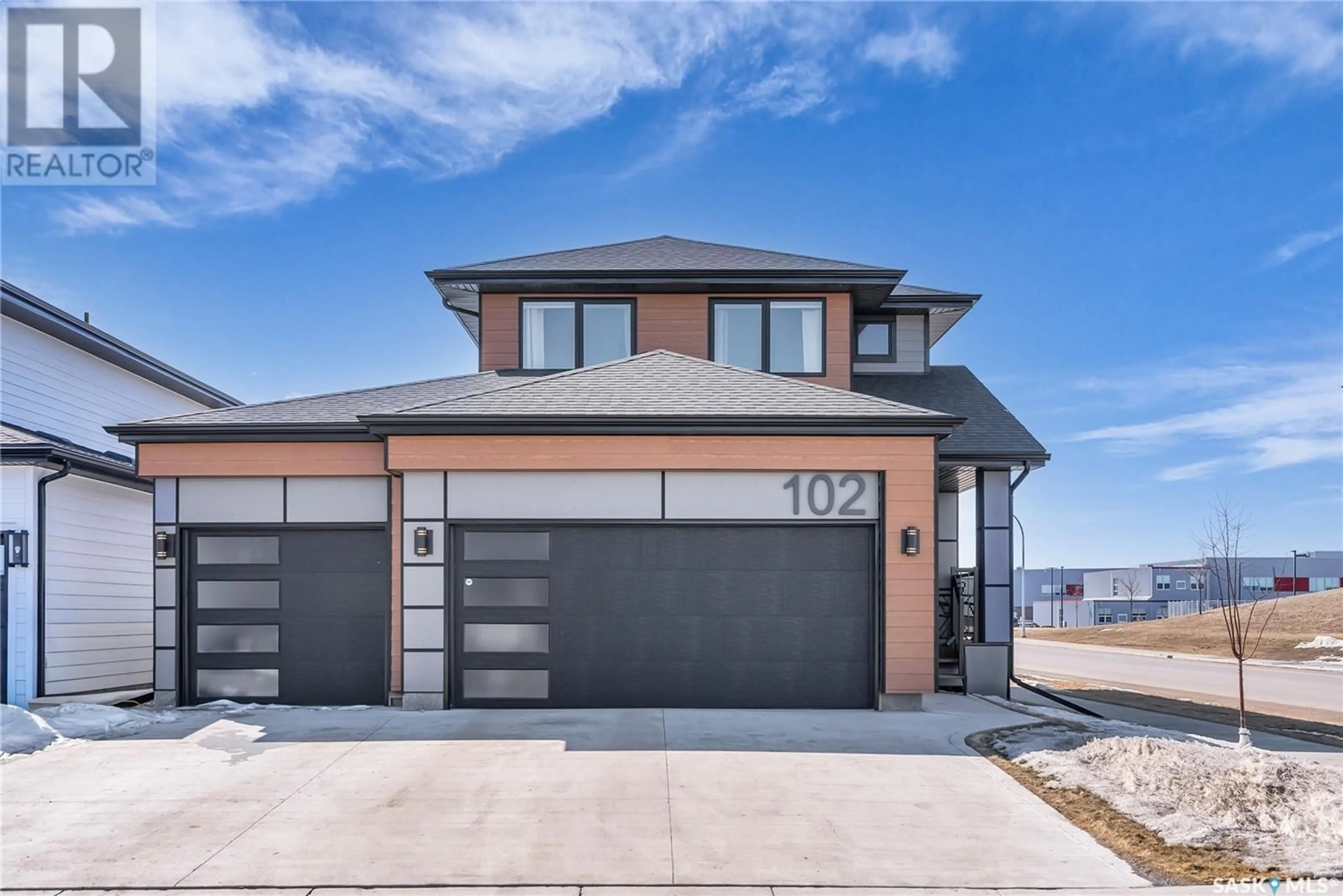 Home with brick exterior material, street for 102 KEITH WAY, Saskatoon Saskatchewan S7V0P4