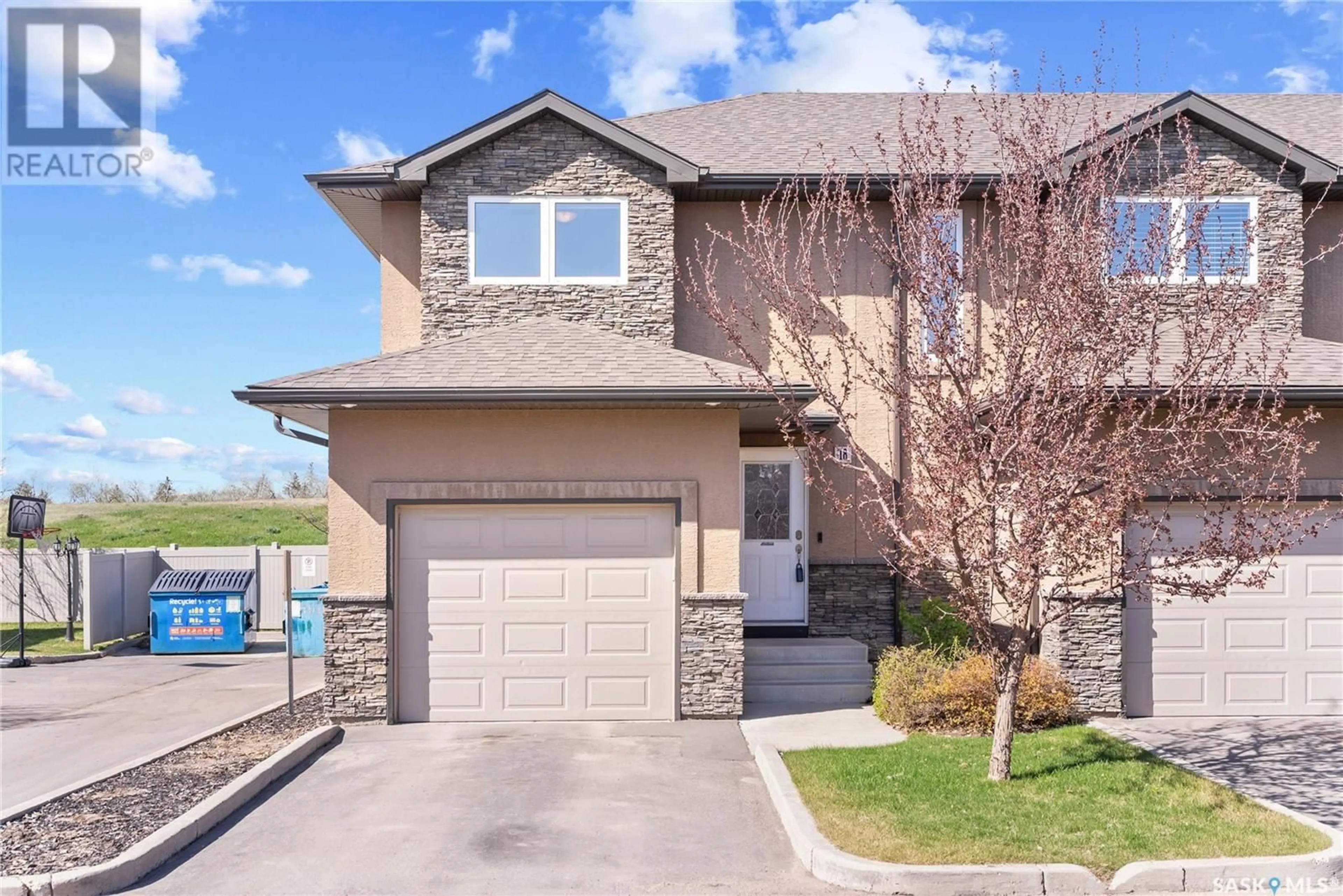 Home with brick exterior material, street for 18 502 REMPEL MANOR, Saskatoon Saskatchewan S7T0L7