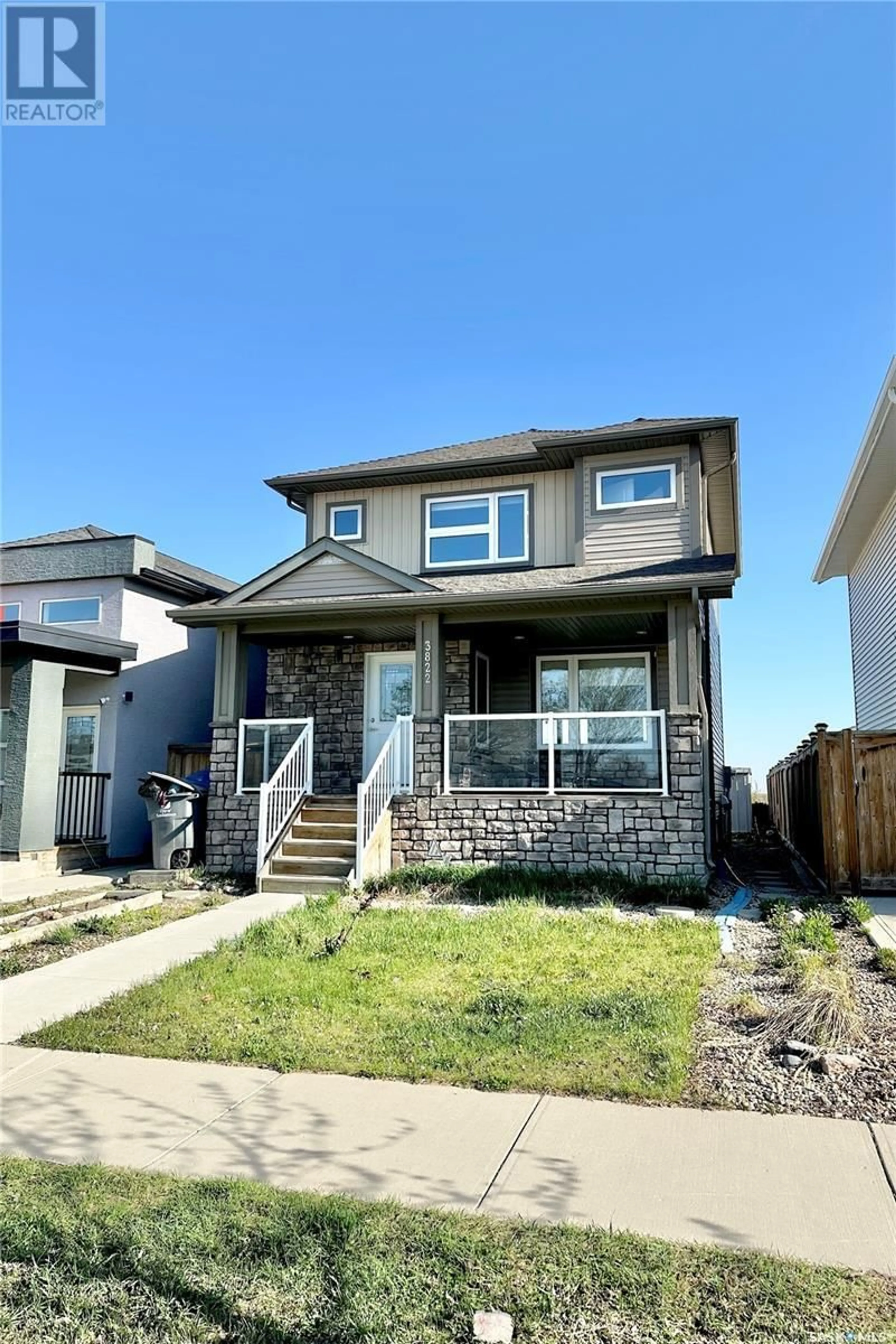 Home with vinyl exterior material, street for 3822 33RD STREET, Saskatoon Saskatchewan S7R0M1