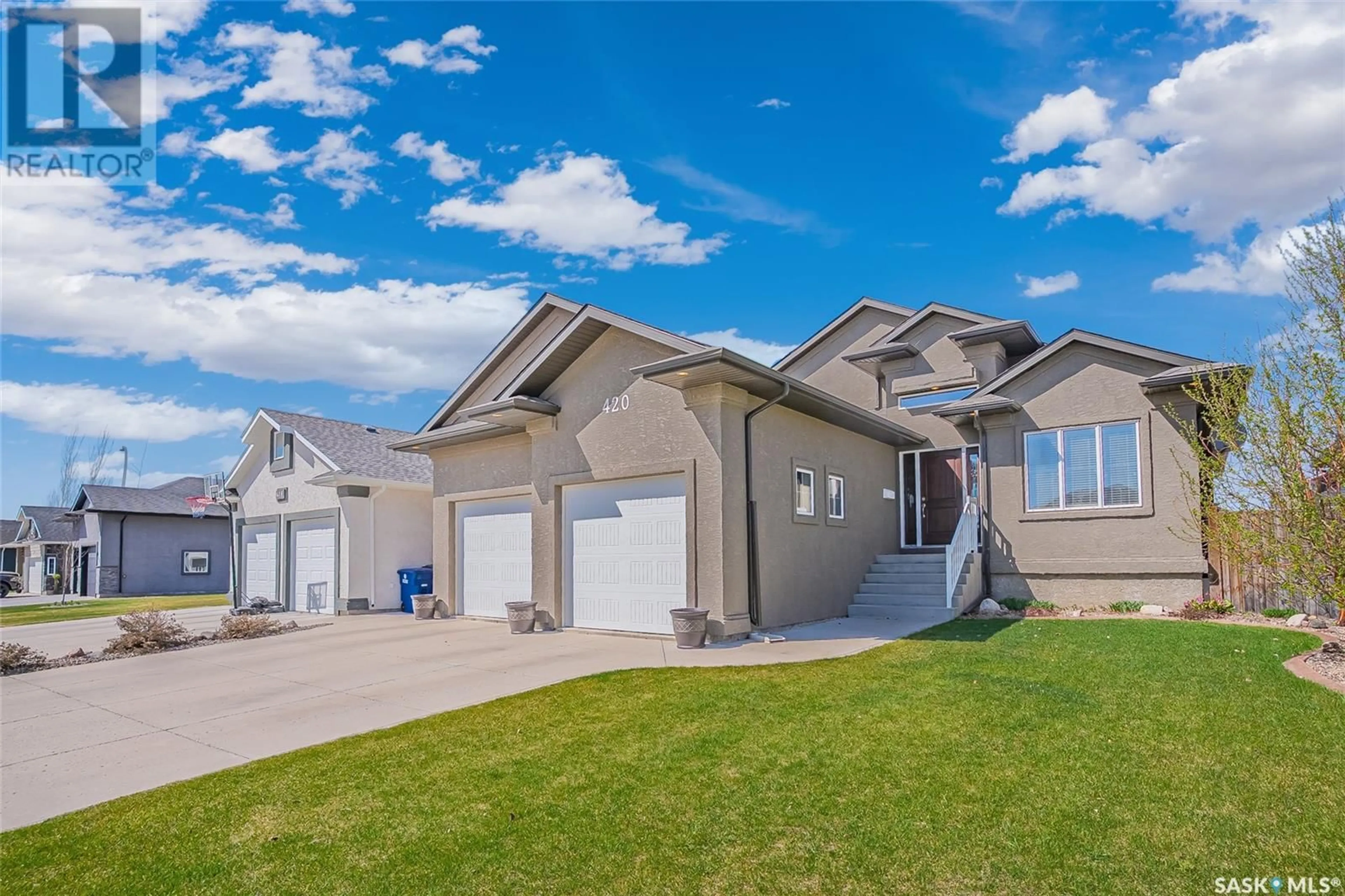 Home with vinyl exterior material, street for 420 WATSON WAY, Warman Saskatchewan S0K4S0