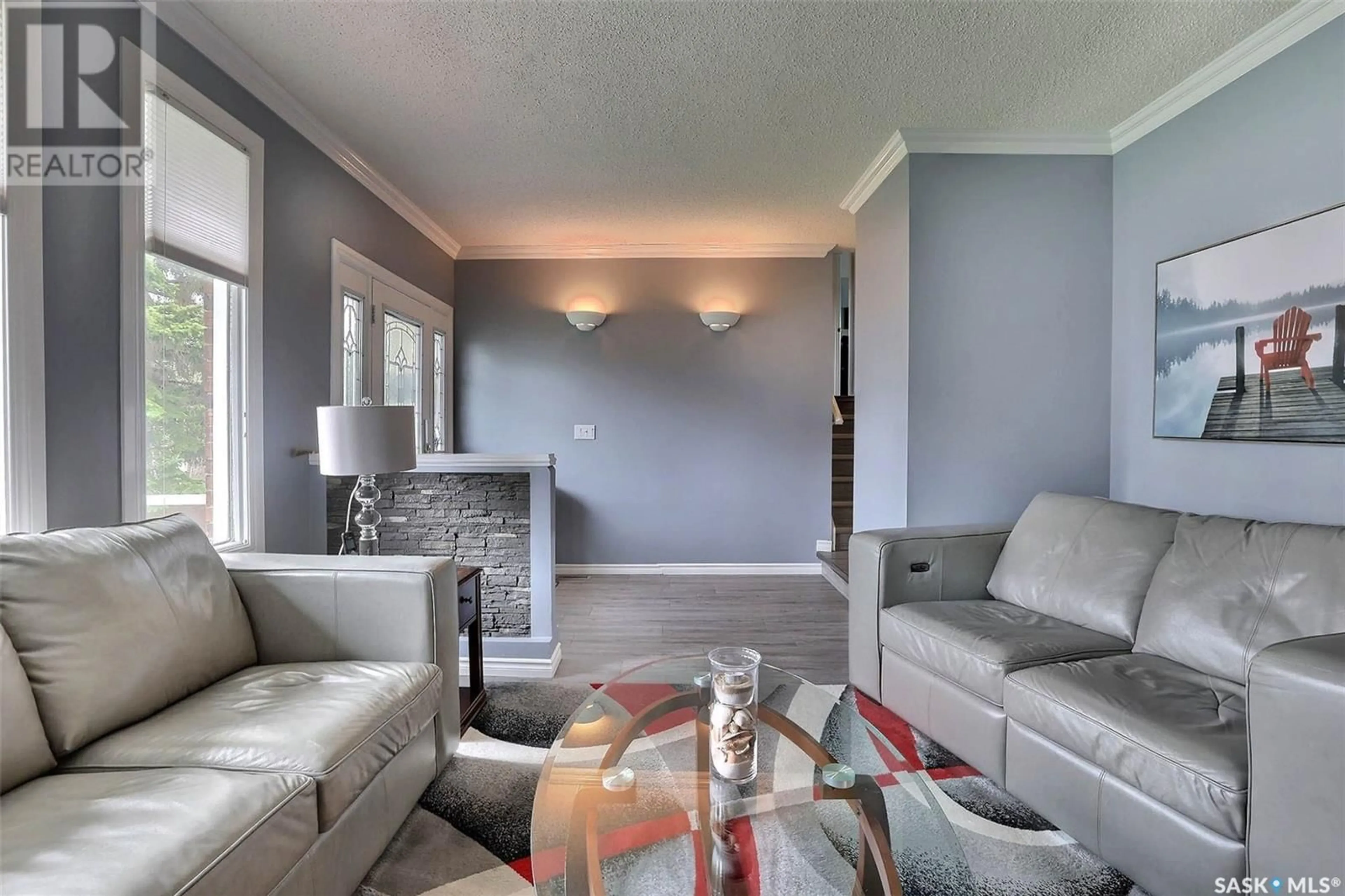 Living room with furniture, unknown for 32 DOWIE BAY, Regina Saskatchewan S4R5W3