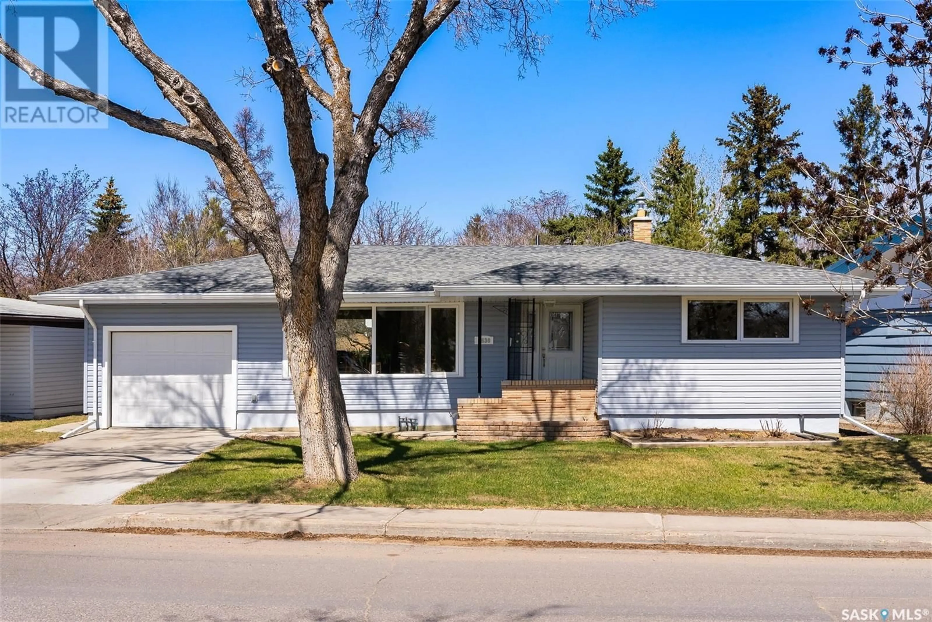 Home with vinyl exterior material, street for 1830 JUBILEE AVENUE, Regina Saskatchewan S4S3T6