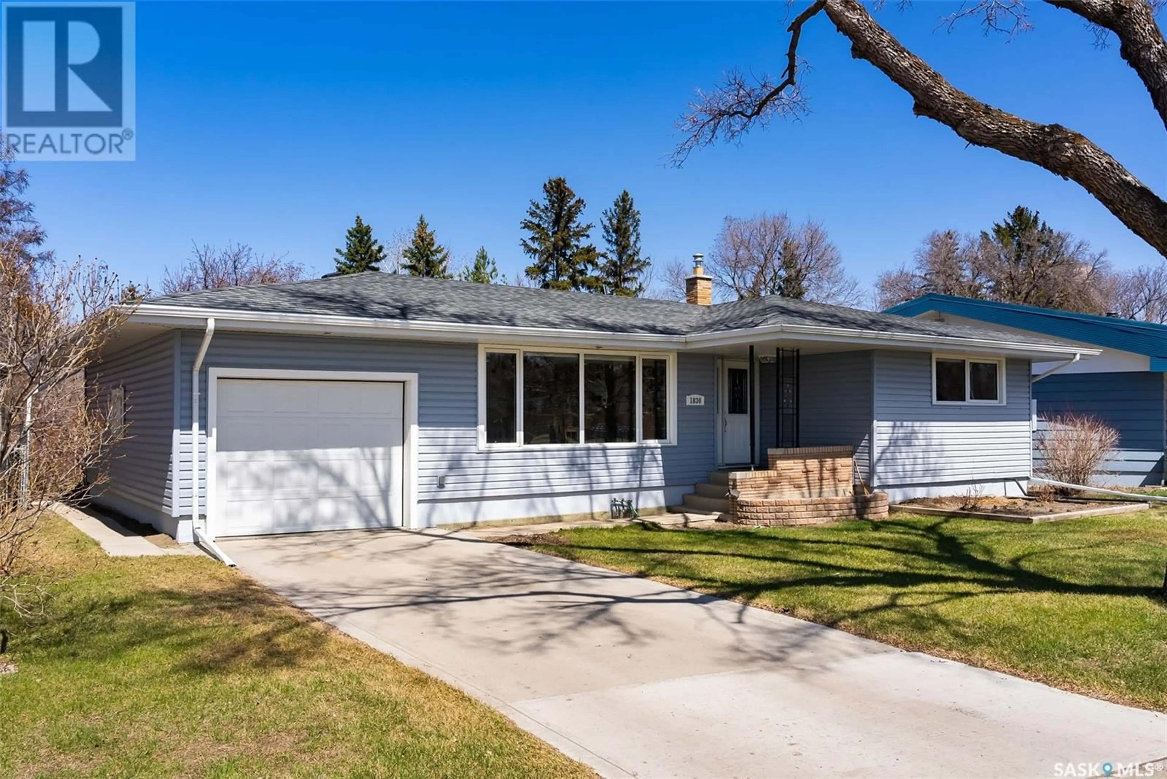 Home with vinyl exterior material, street for 1830 JUBILEE AVENUE, Regina Saskatchewan S4S3T6