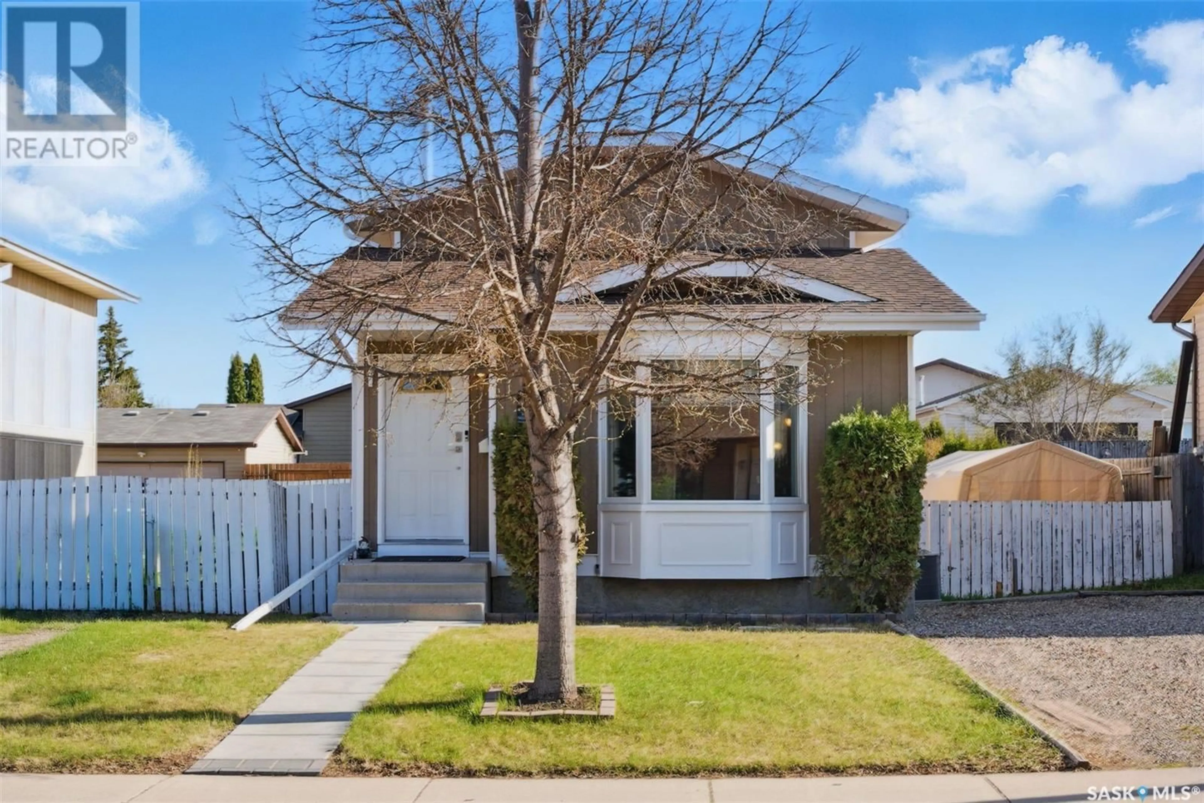 Home with vinyl exterior material, street for 111 CARTER CRESCENT, Saskatoon Saskatchewan S7L7K3