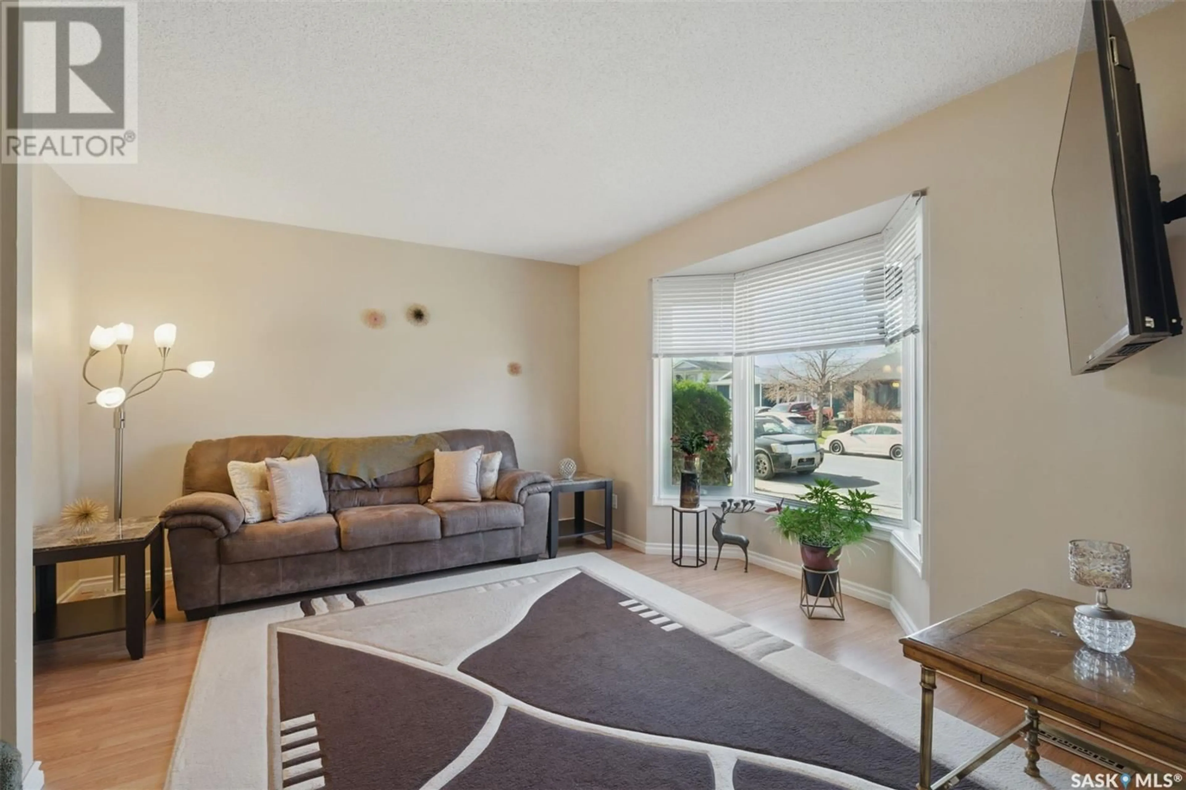 Living room with furniture, unknown for 111 CARTER CRESCENT, Saskatoon Saskatchewan S7L7K3