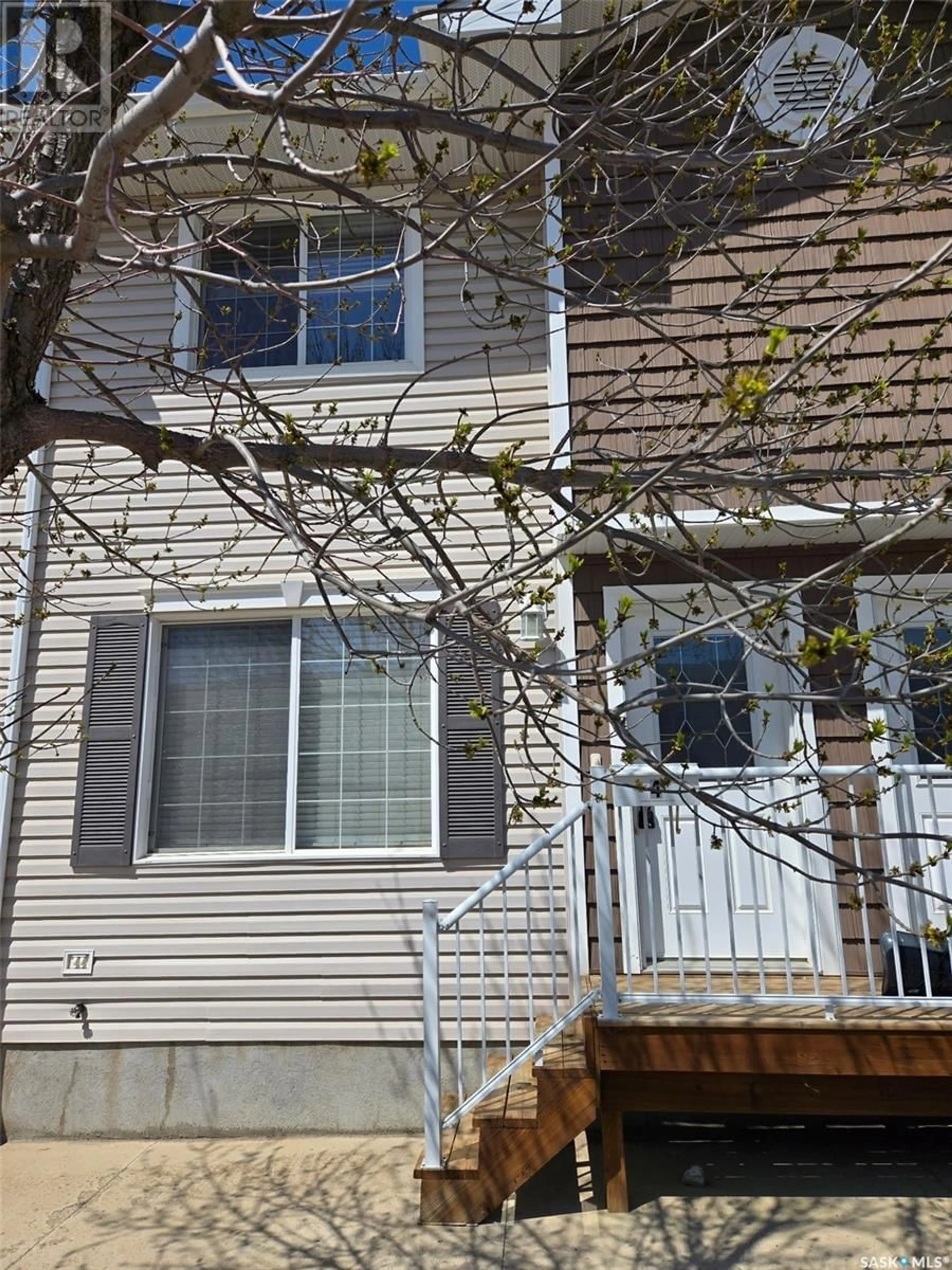 Home with vinyl exterior material, street for 4 - 1621 FIRST STREET, Estevan Saskatchewan S4A2X4