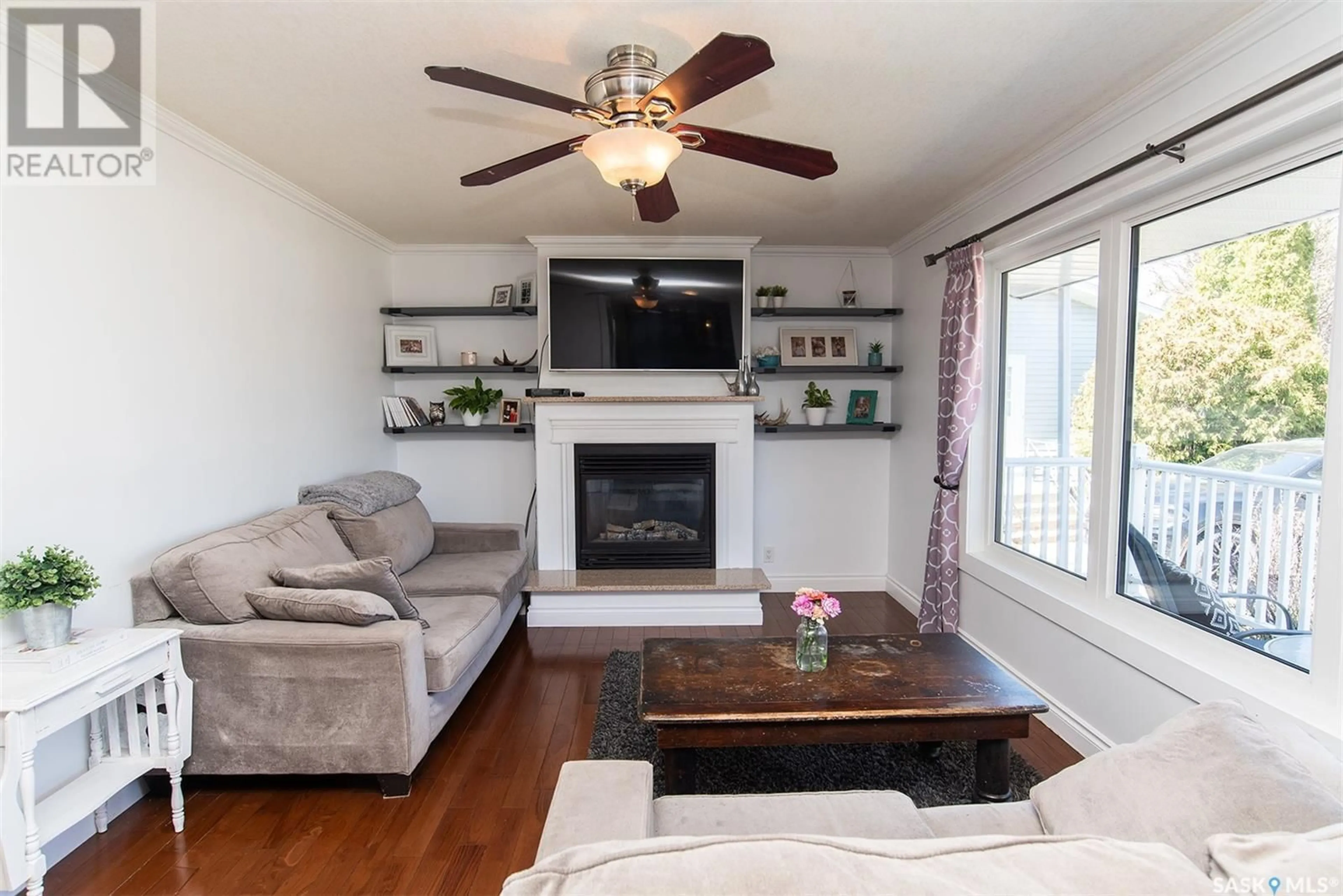Living room with furniture, wood/laminate floor for 207 BROOKDALE PLACE, Wynyard Saskatchewan S0A4T0