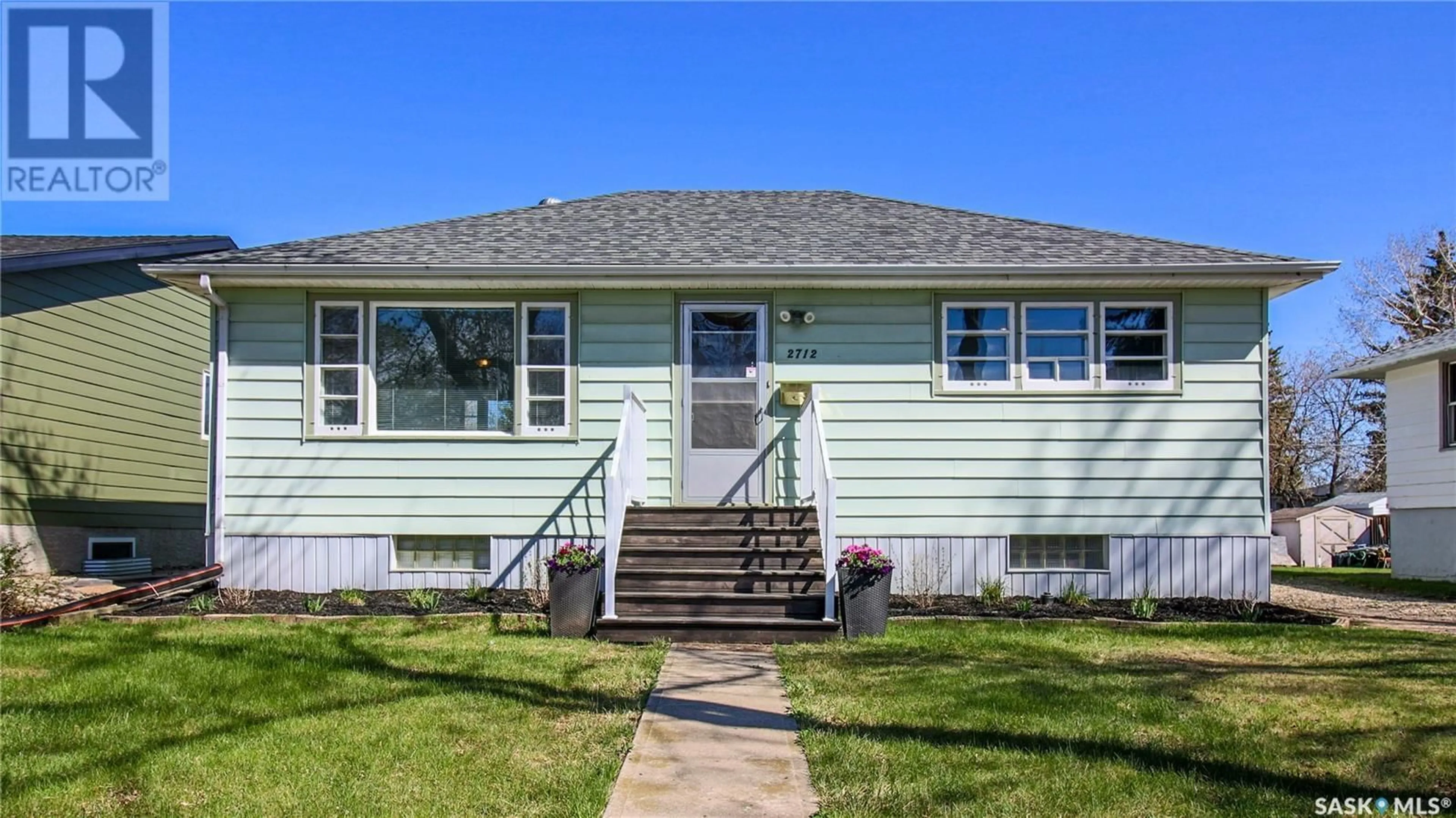 Home with vinyl exterior material, street for 2712 SINTON AVENUE, Regina Saskatchewan S4S1K1