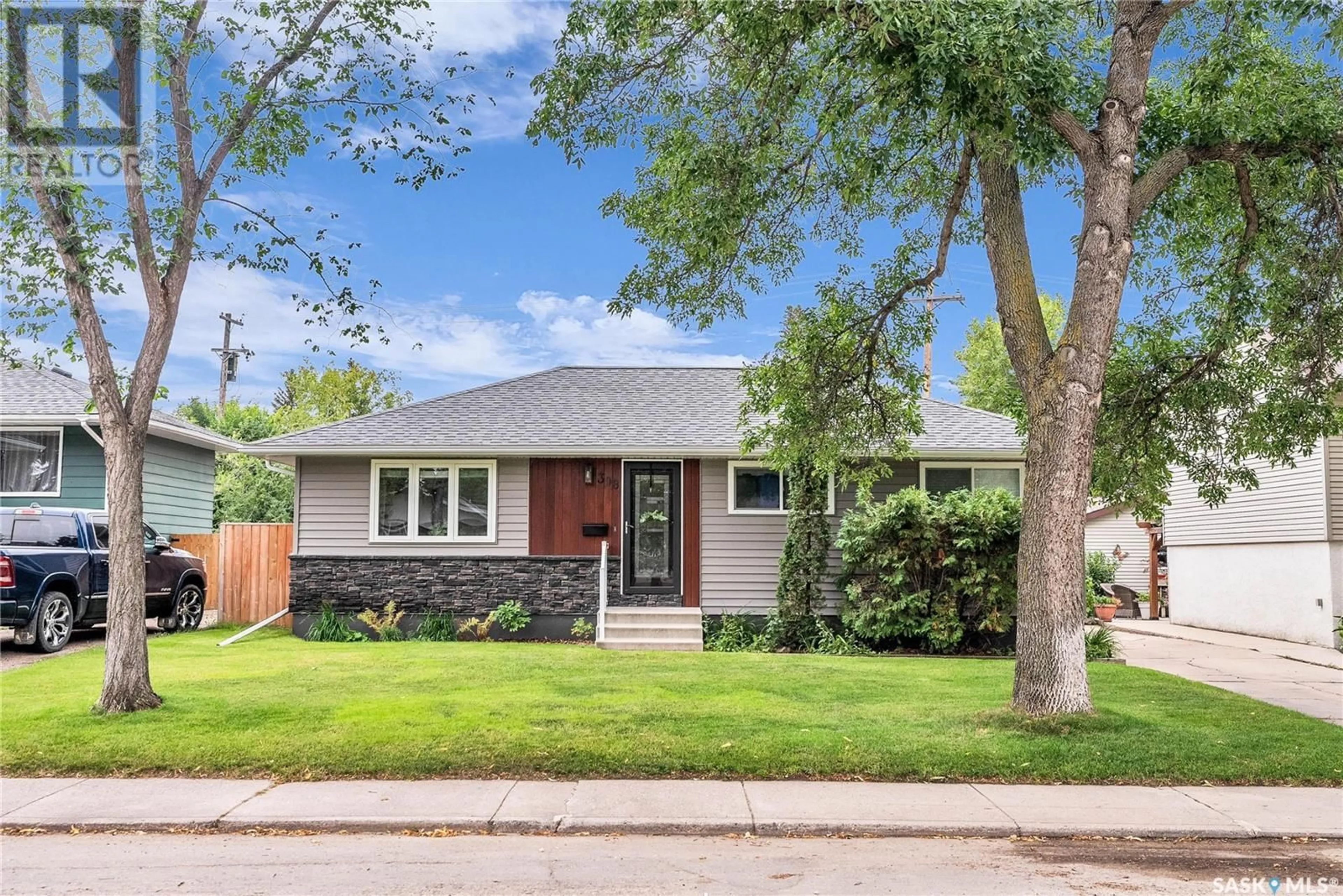 Home with brick exterior material, street for 308 CASCADE STREET, Saskatoon Saskatchewan S7J0M5