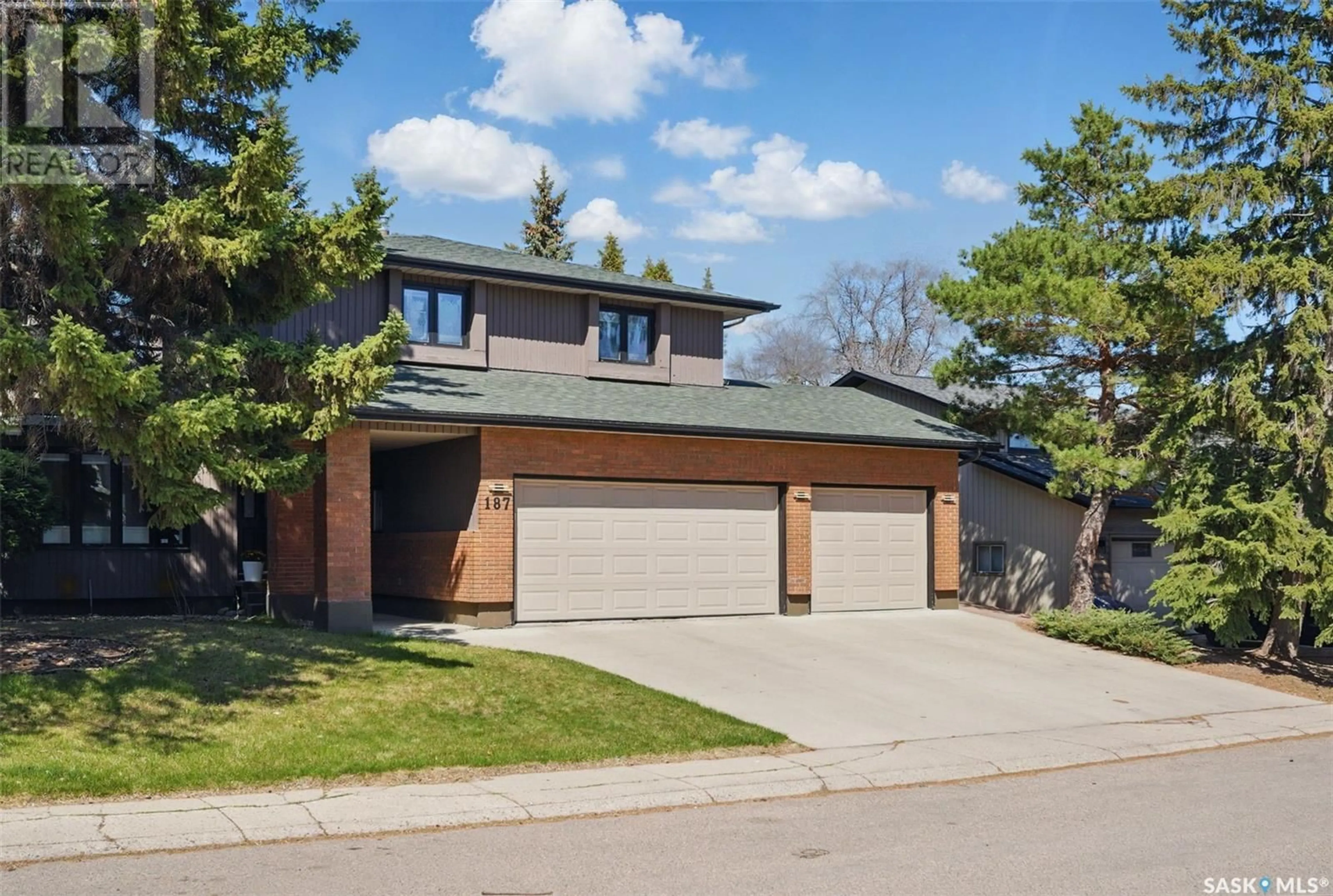 Home with brick exterior material, street for 187 LAKESHORE CRESCENT, Saskatoon Saskatchewan S7J3T4