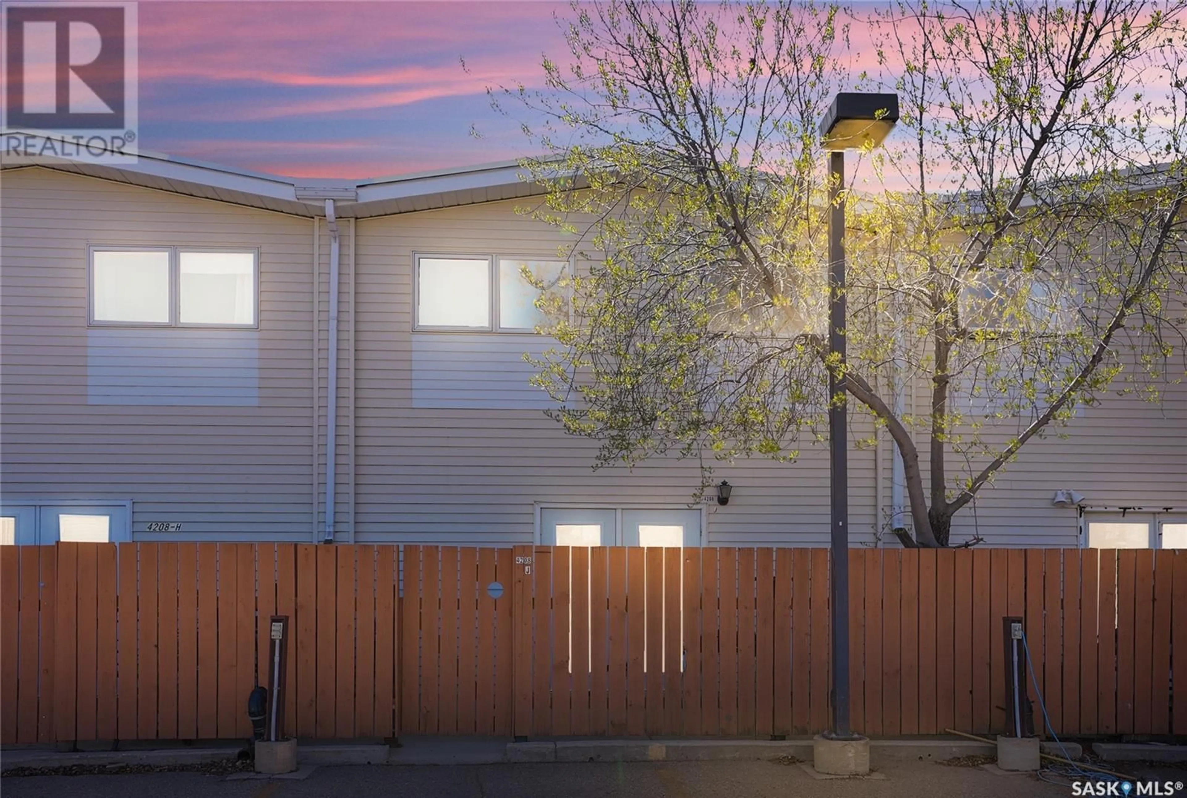 A pic from outside/outdoor area/front of a property/back of a property/a pic from drone, street for 4208 CASTLE ROAD, Regina Saskatchewan S4S4W1