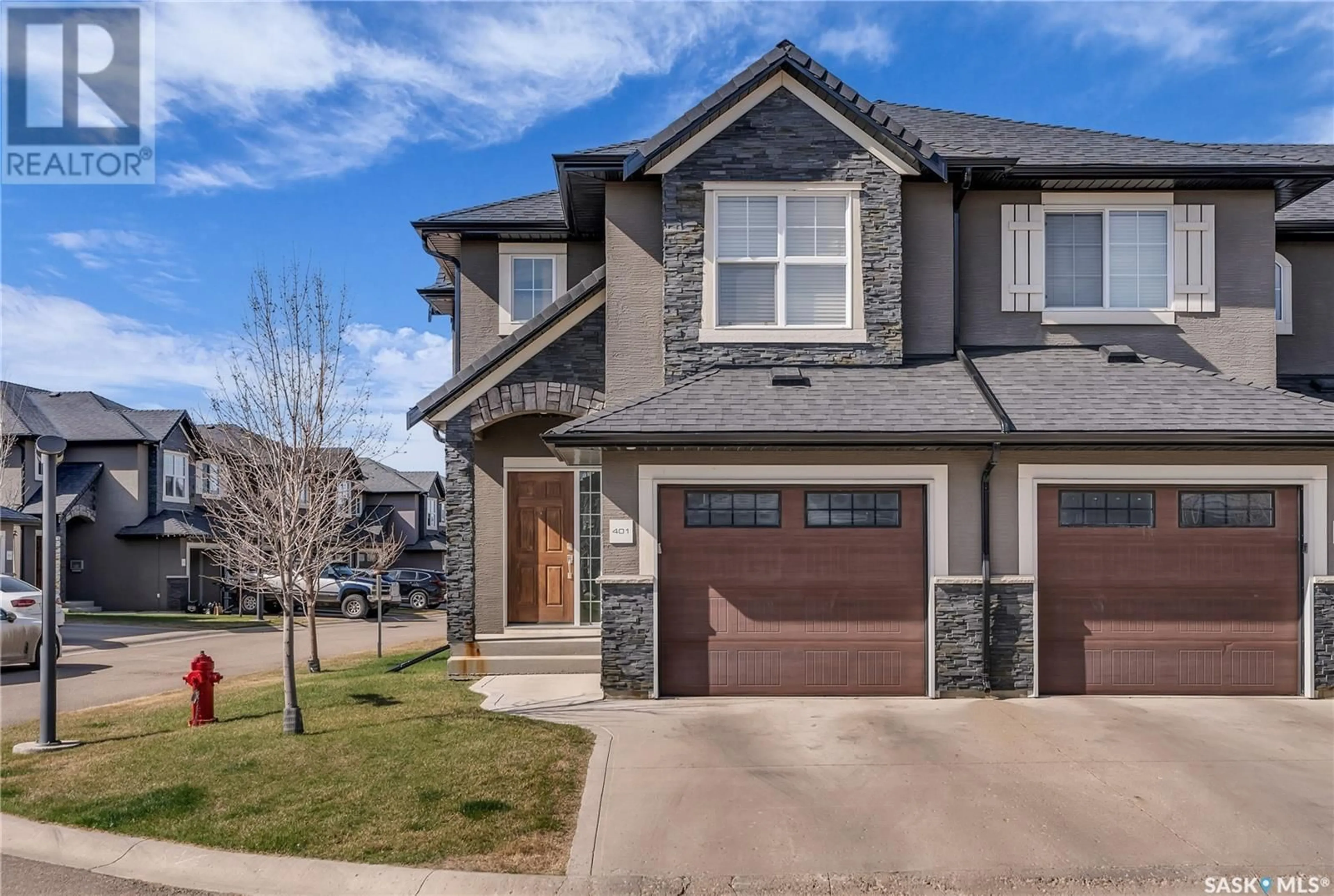 Home with brick exterior material, street for 401 - 1303 PATON CRESCENT, Saskatoon Saskatchewan S7W0P6