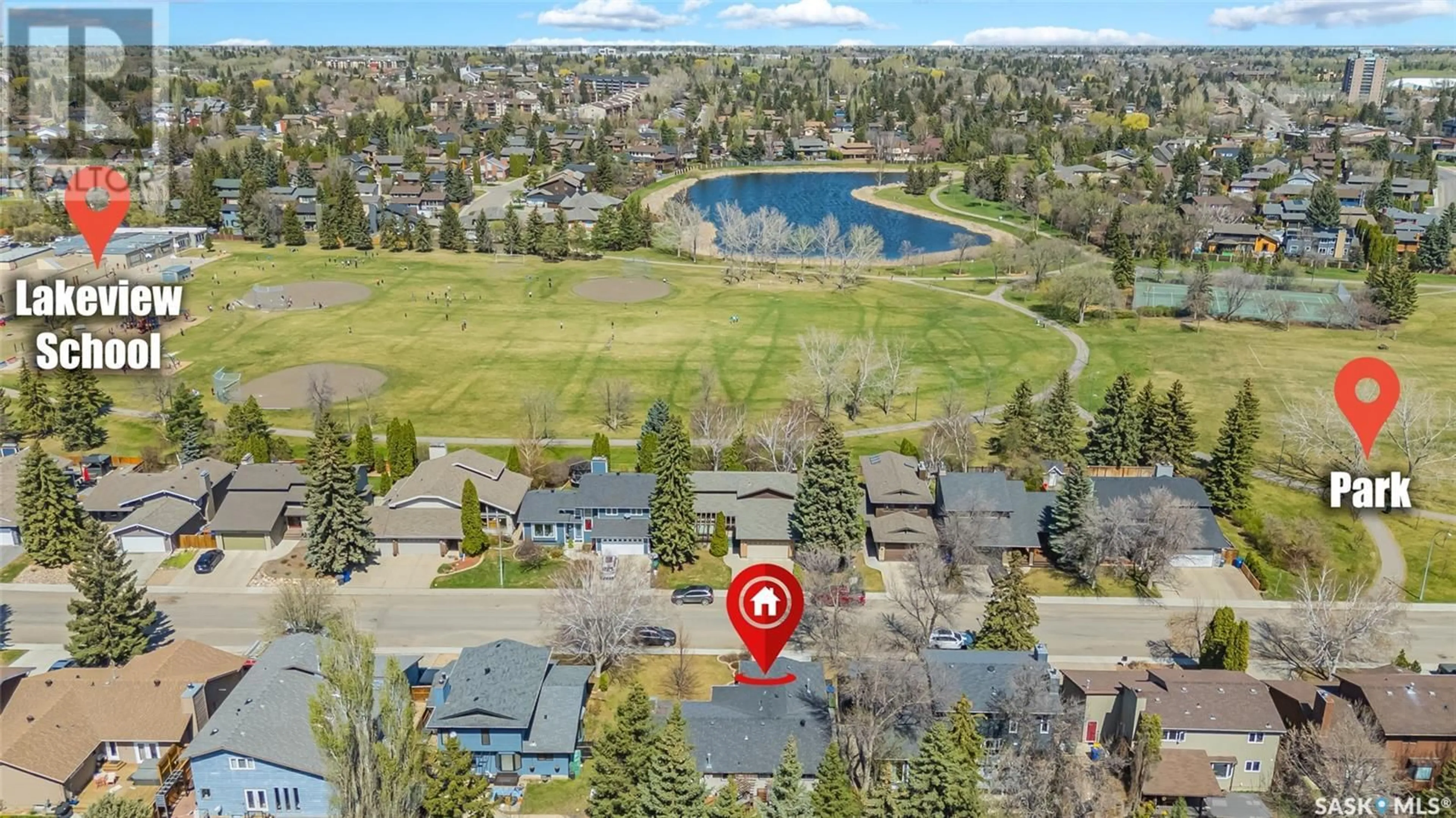 A pic from outside/outdoor area/front of a property/back of a property/a pic from drone, water/lake/river/ocean view for 154 WHITESHORE CRESCENT, Saskatoon Saskatchewan S7J3W5