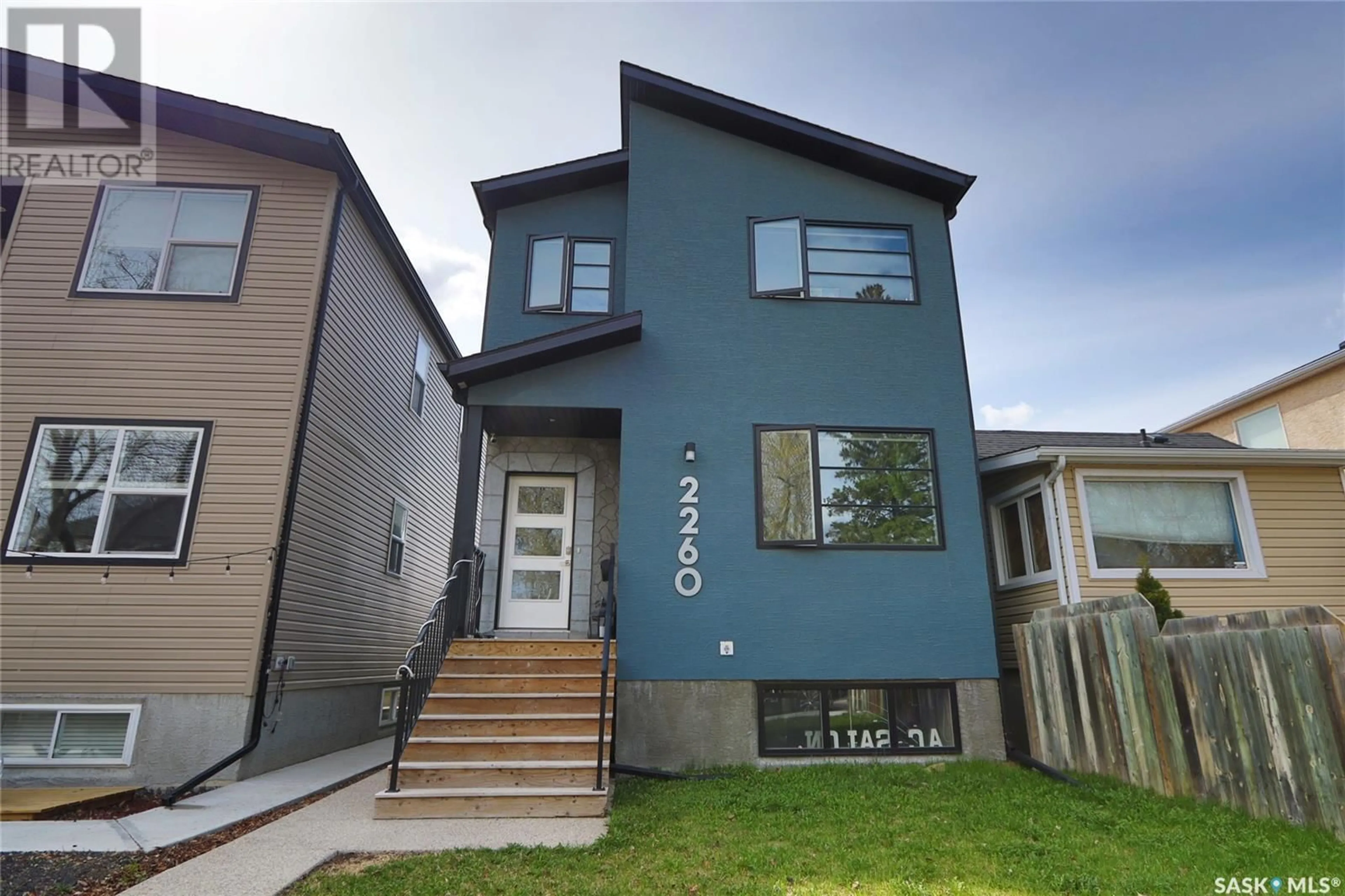 Home with vinyl exterior material, street for 2260 WASCANA STREET, Regina Saskatchewan S4S6Y9
