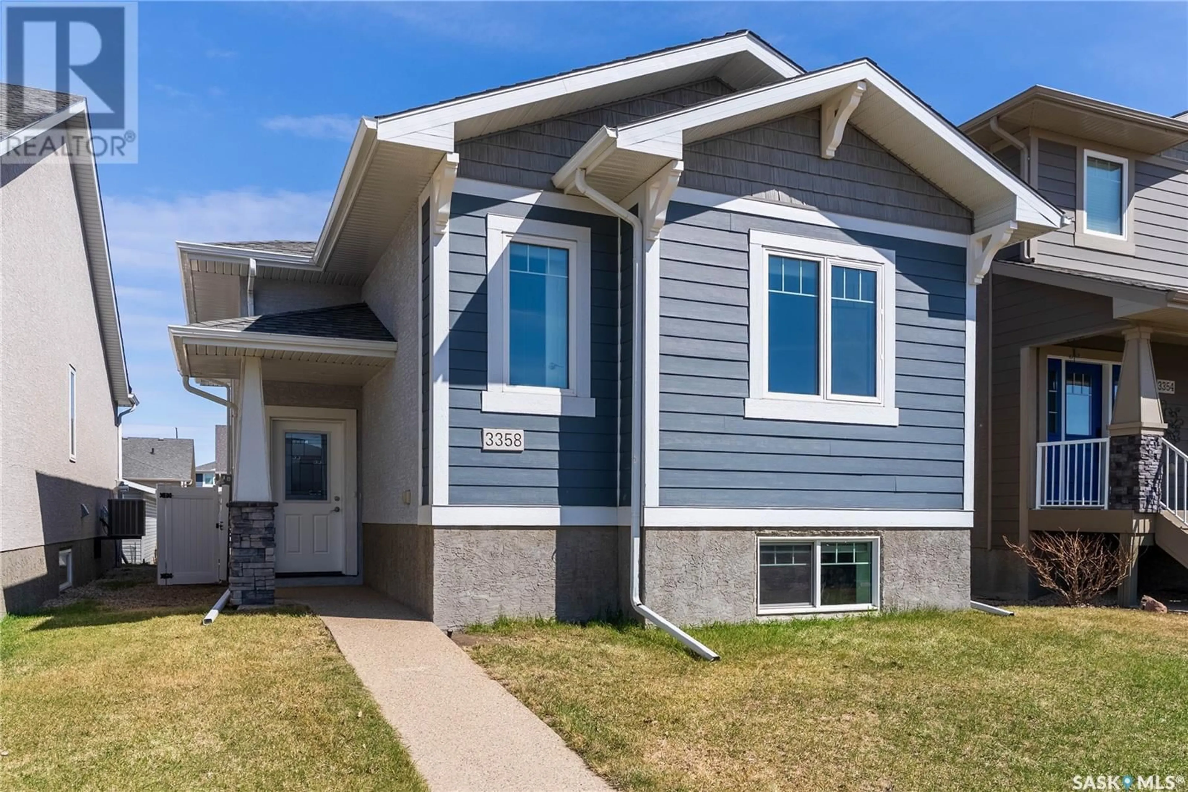 Home with vinyl exterior material, street for 3358 ELGAARD DRIVE, Regina Saskatchewan S4X0J9