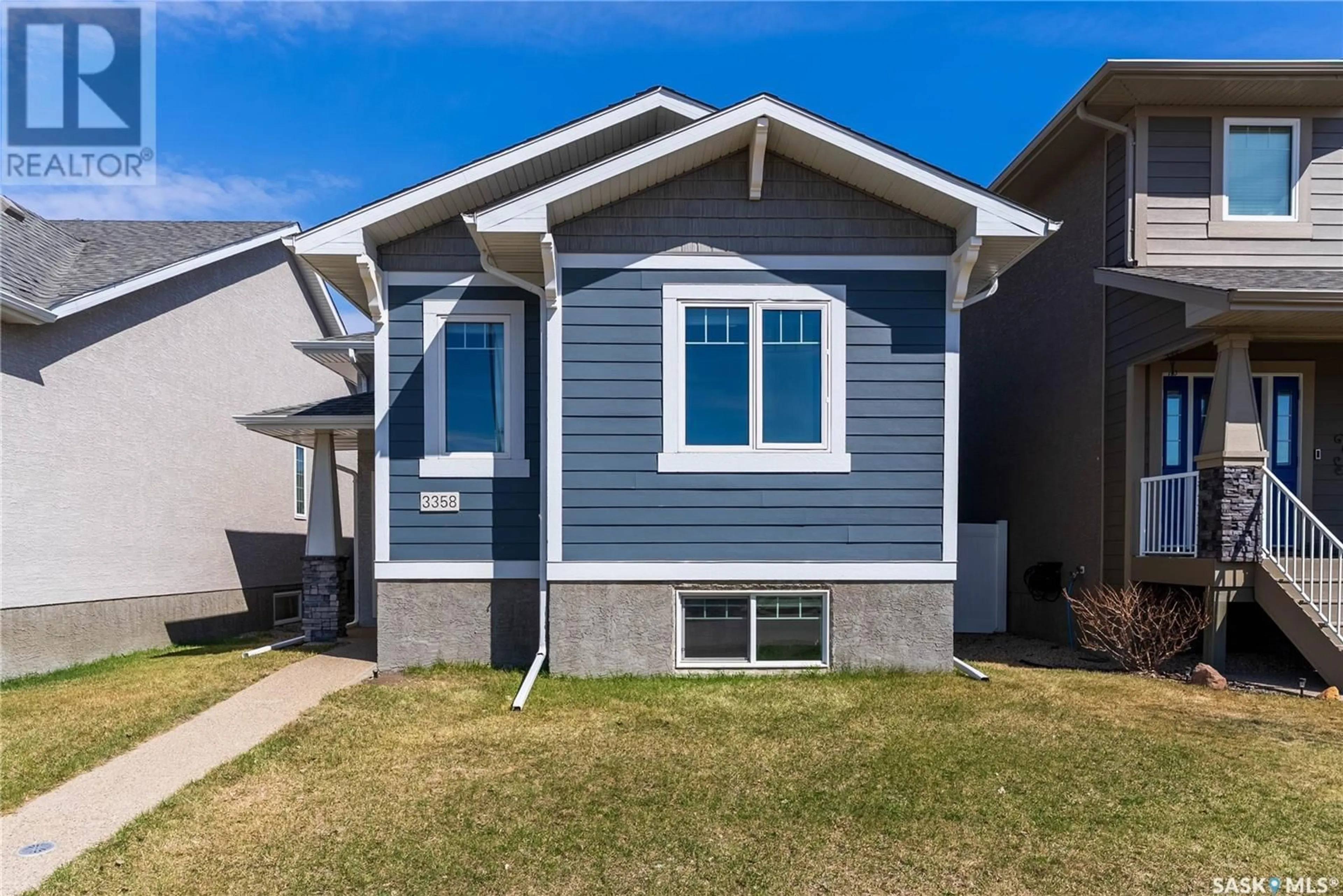 Home with vinyl exterior material, street for 3358 ELGAARD DRIVE, Regina Saskatchewan S4X0J9