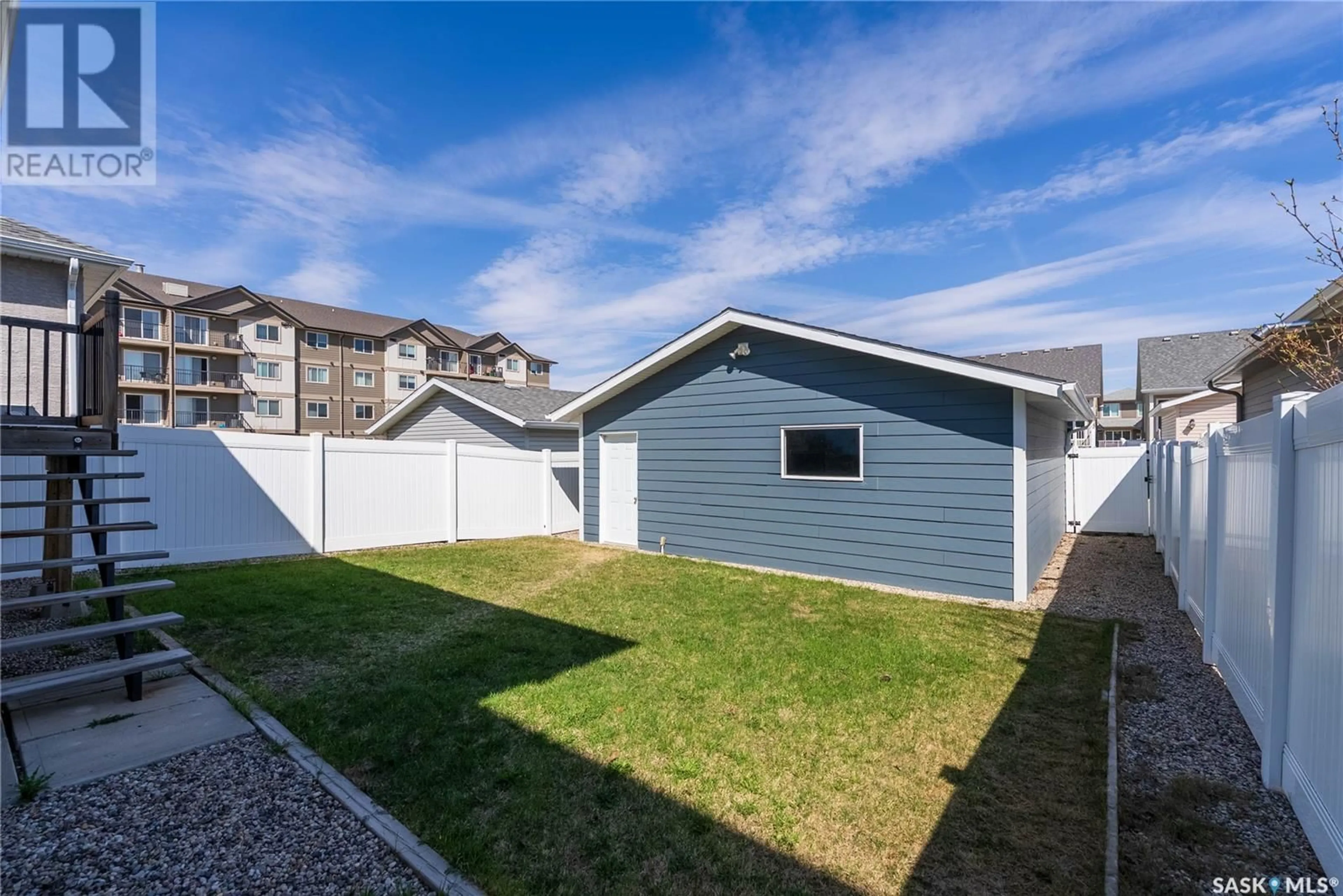 Home with vinyl exterior material, street for 3358 ELGAARD DRIVE, Regina Saskatchewan S4X0J9