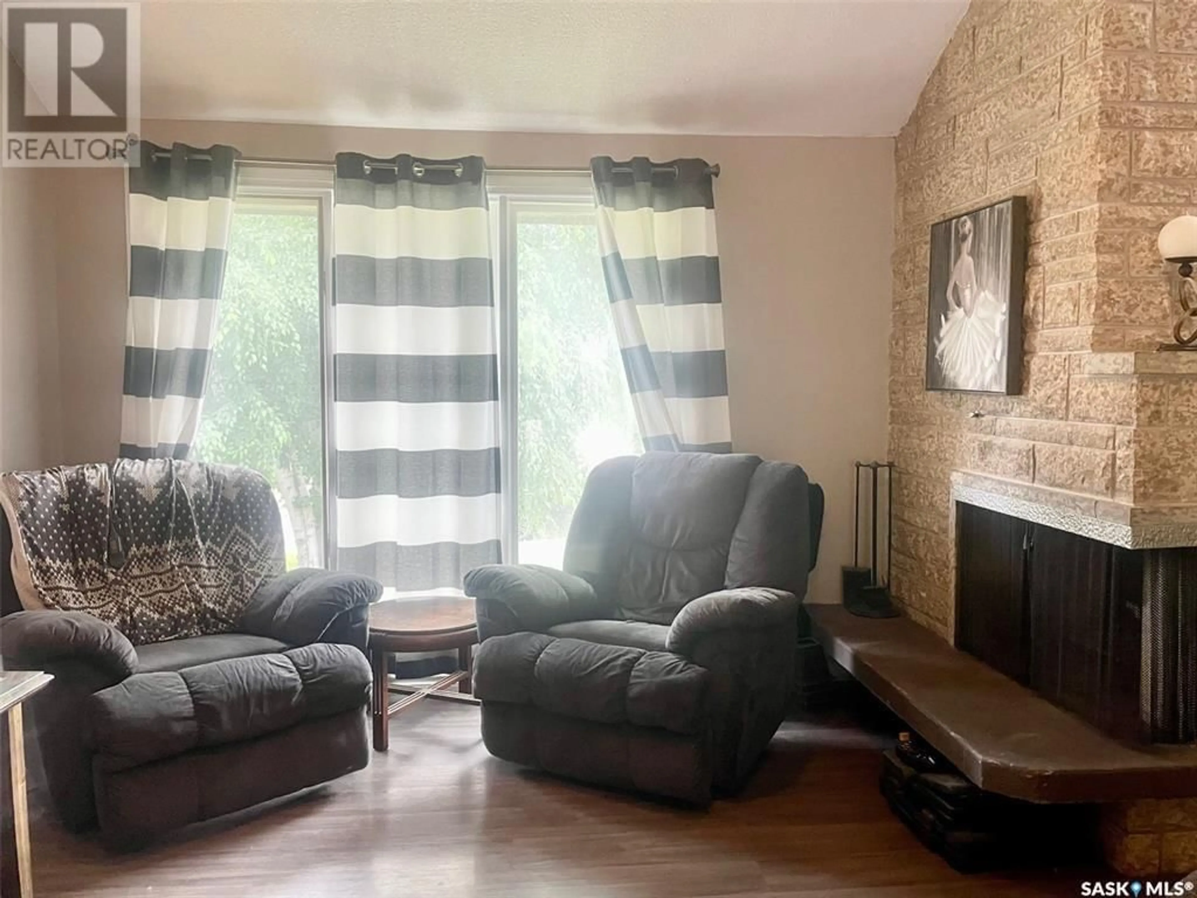 Living room with furniture, unknown for 20 ELMWOOD PLACE, Yorkton Saskatchewan S3N3K8
