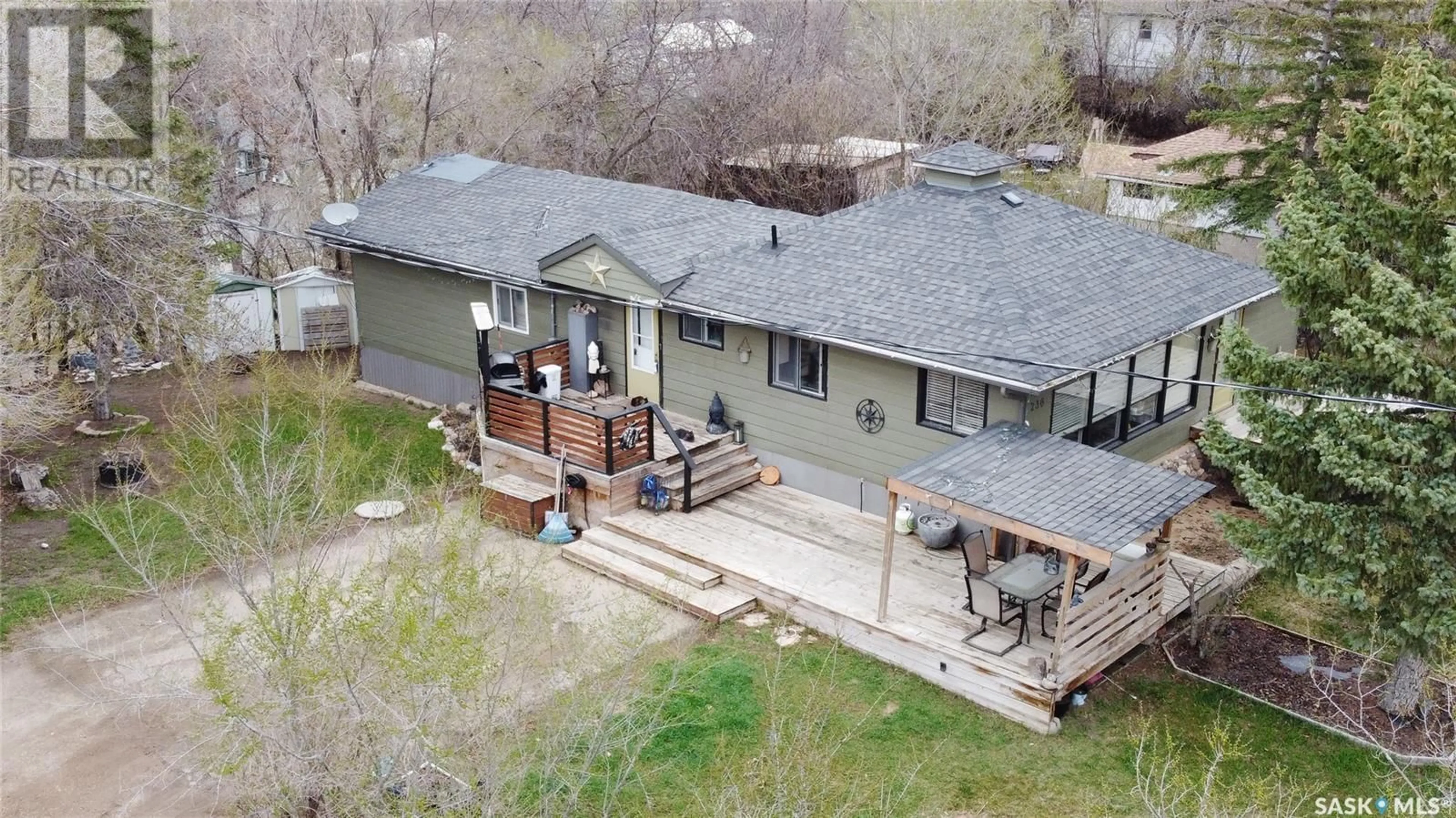 A pic from outside/outdoor area/front of a property/back of a property/a pic from drone, building for 236 MACMURCHY AVENUE, Regina Beach Saskatchewan S0G4C0