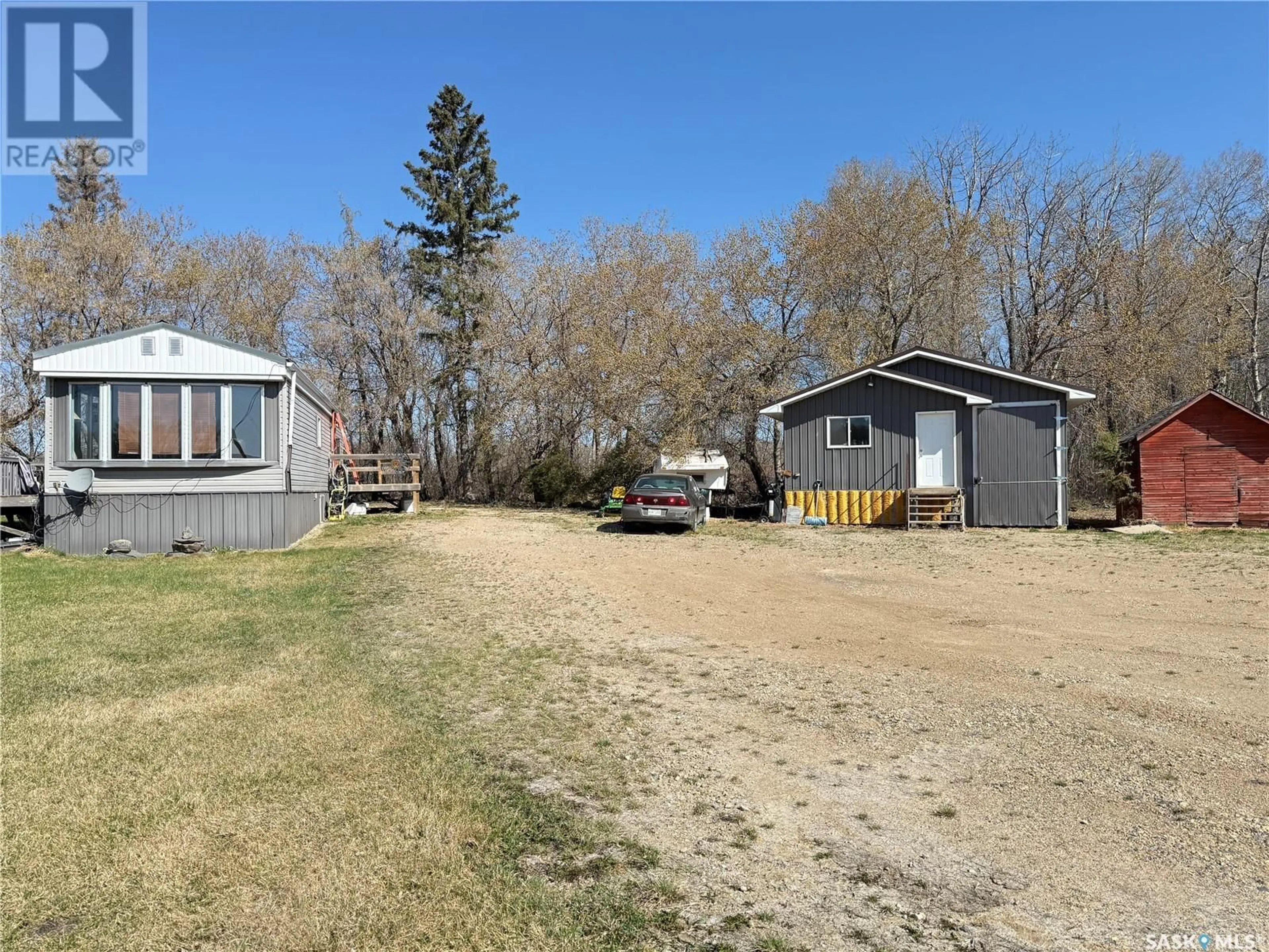 A pic from outside/outdoor area/front of a property/back of a property/a pic from drone, street for LUCAS ACREAGE, Preeceville Rm No. 334 Saskatchewan S0A3B0