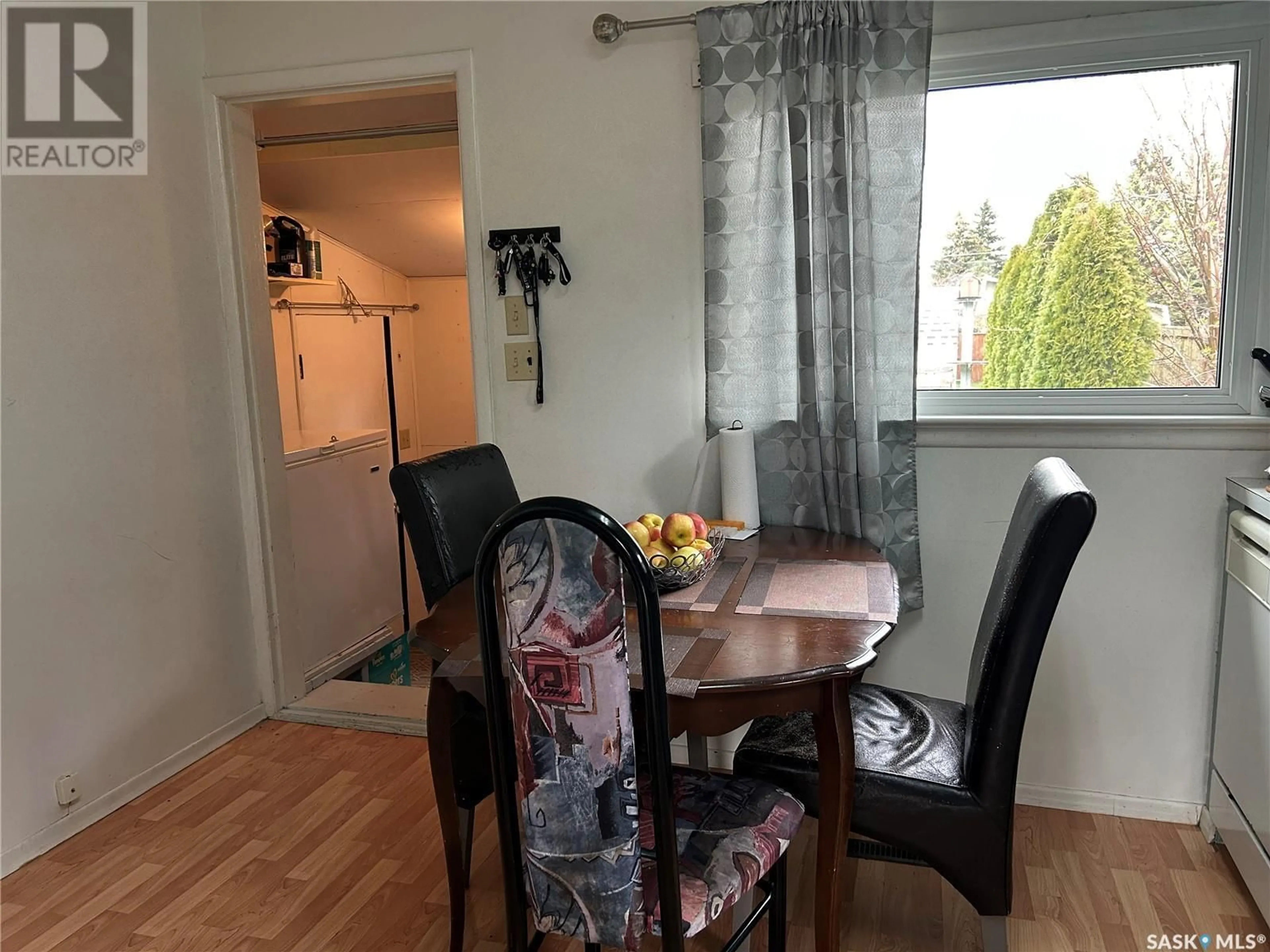 Dining room, wood/laminate floor for 316 4TH AVENUE, Watrous Saskatchewan S0K4T0