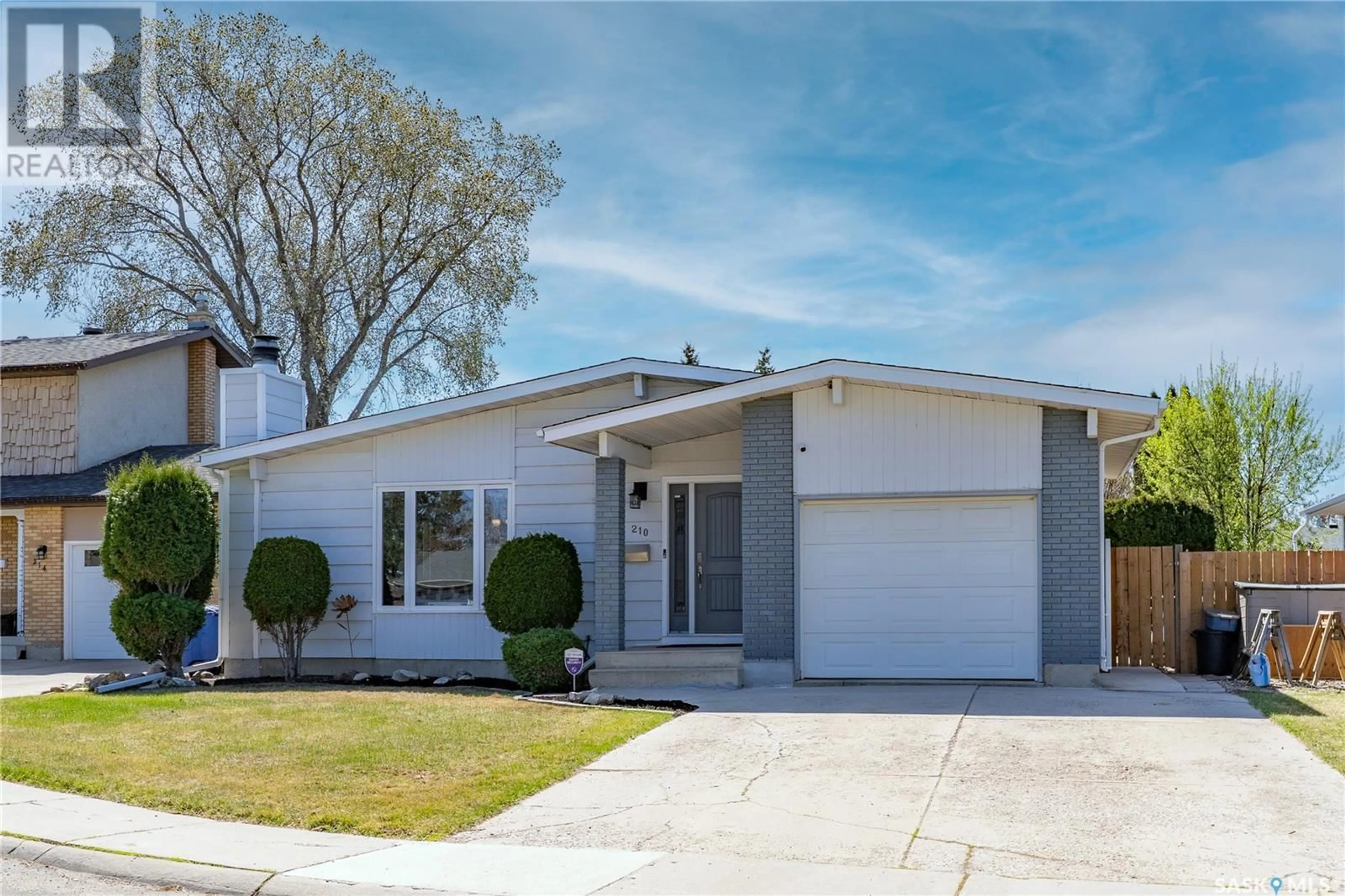 Home with vinyl exterior material, street for 210 LA LOCHE TERRACE, Saskatoon Saskatchewan S7K4R9