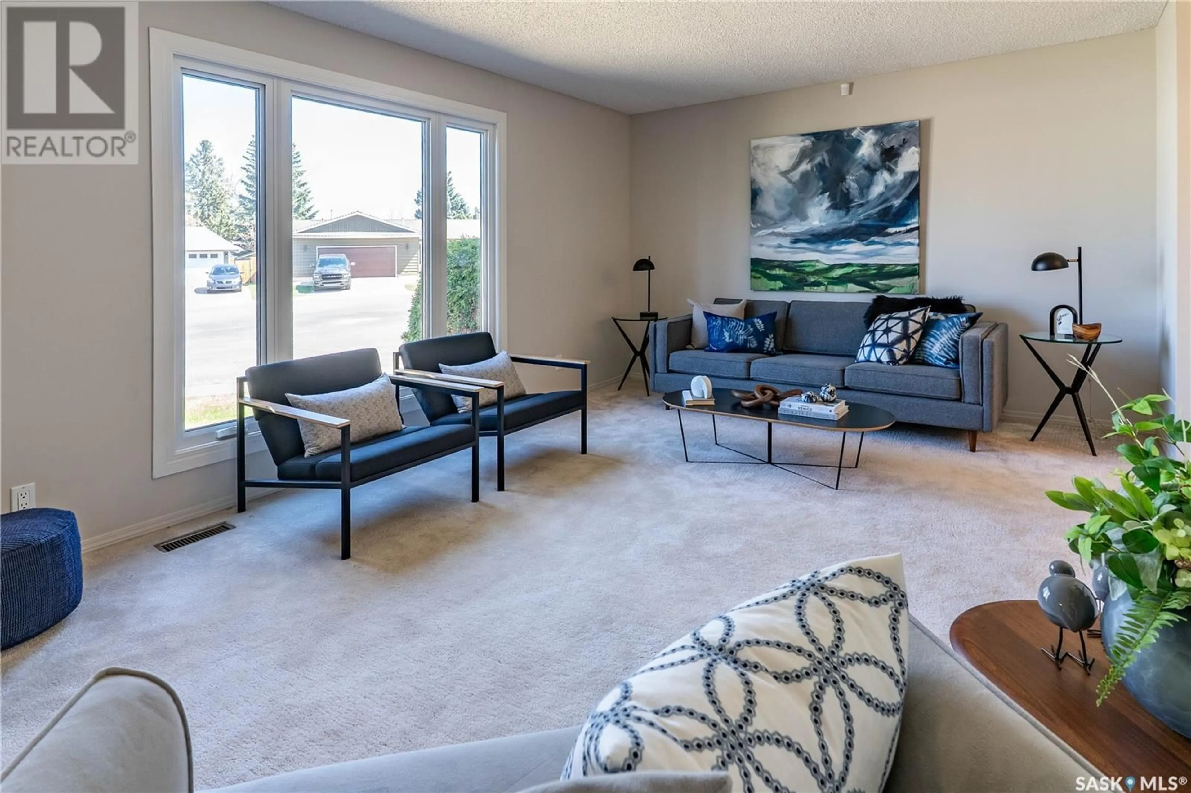 Living room with furniture, carpet floor for 210 LA LOCHE TERRACE, Saskatoon Saskatchewan S7K4R9