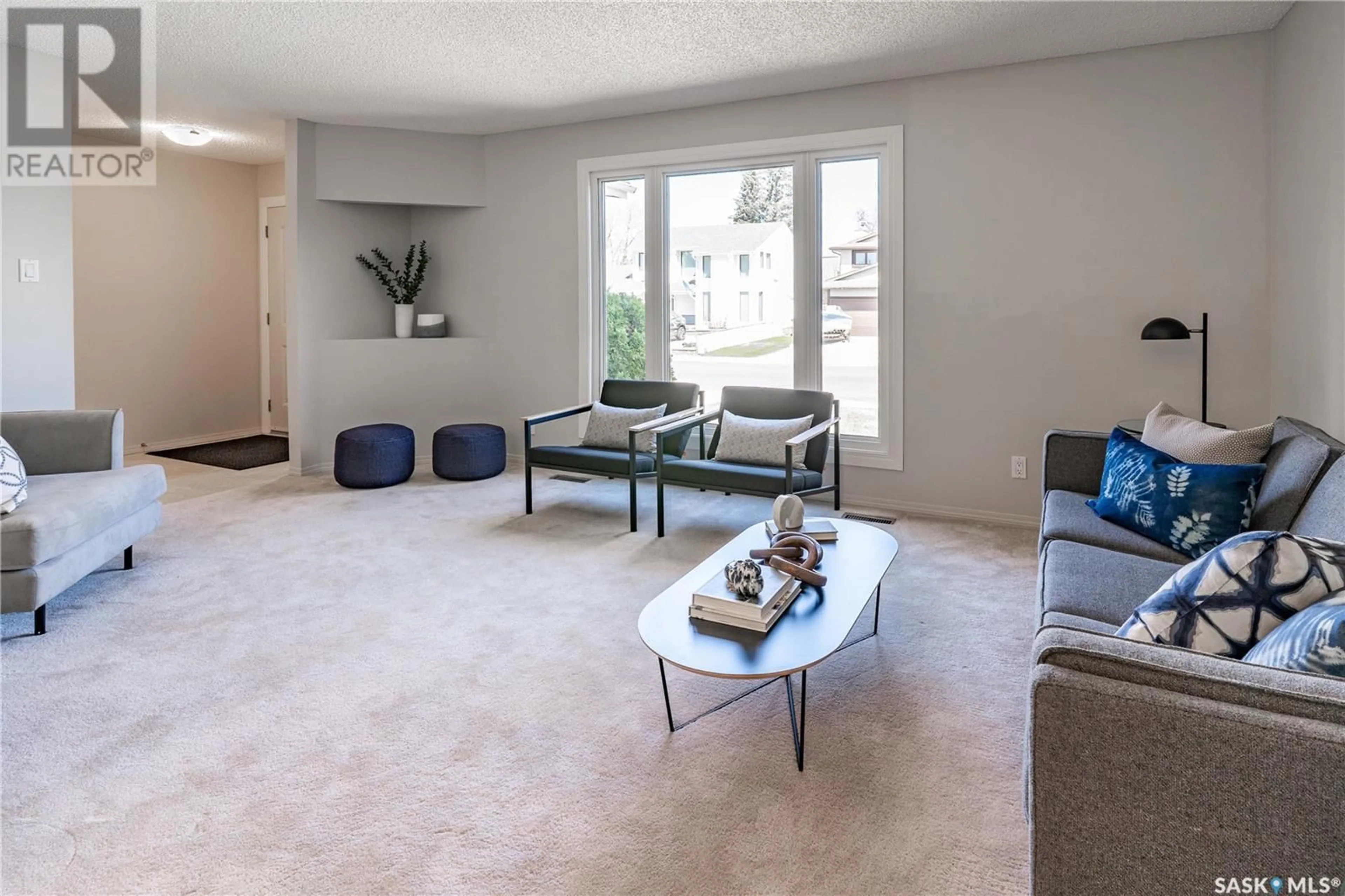 Living room with furniture, carpet floor for 210 LA LOCHE TERRACE, Saskatoon Saskatchewan S7K4R9