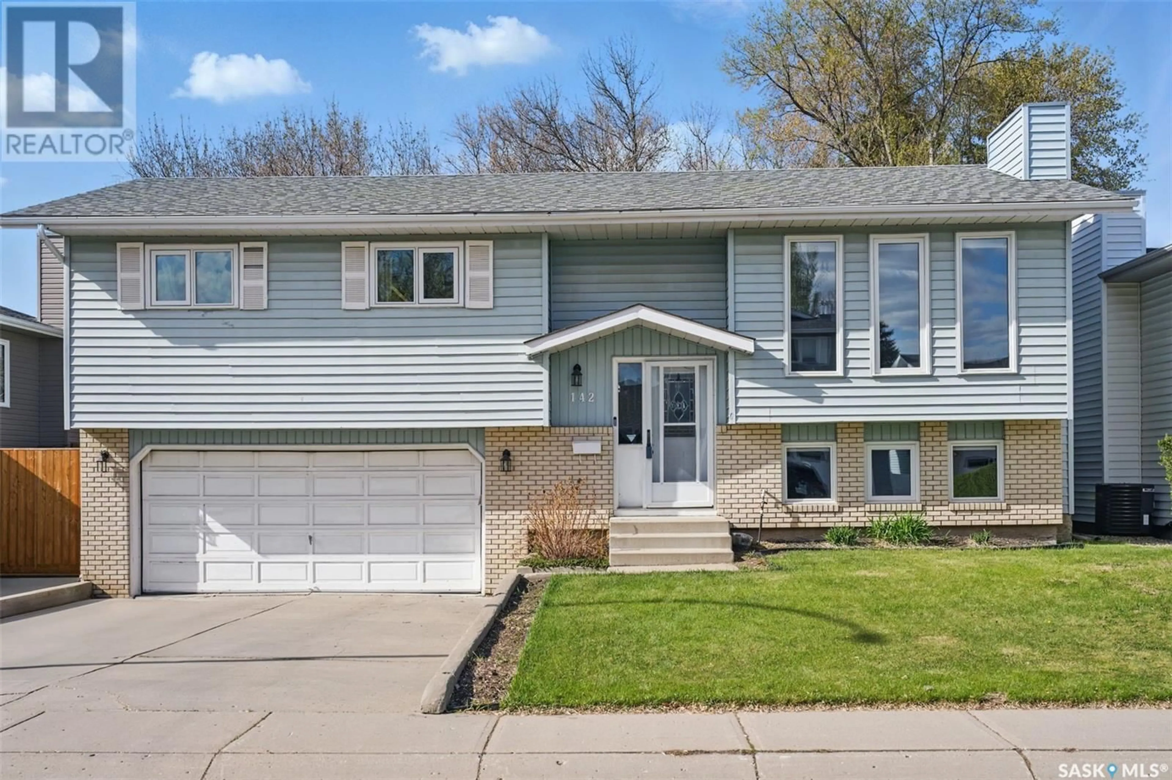 Home with vinyl exterior material, street for 142 STAIGH CRESCENT, Saskatoon Saskatchewan S7N3T3