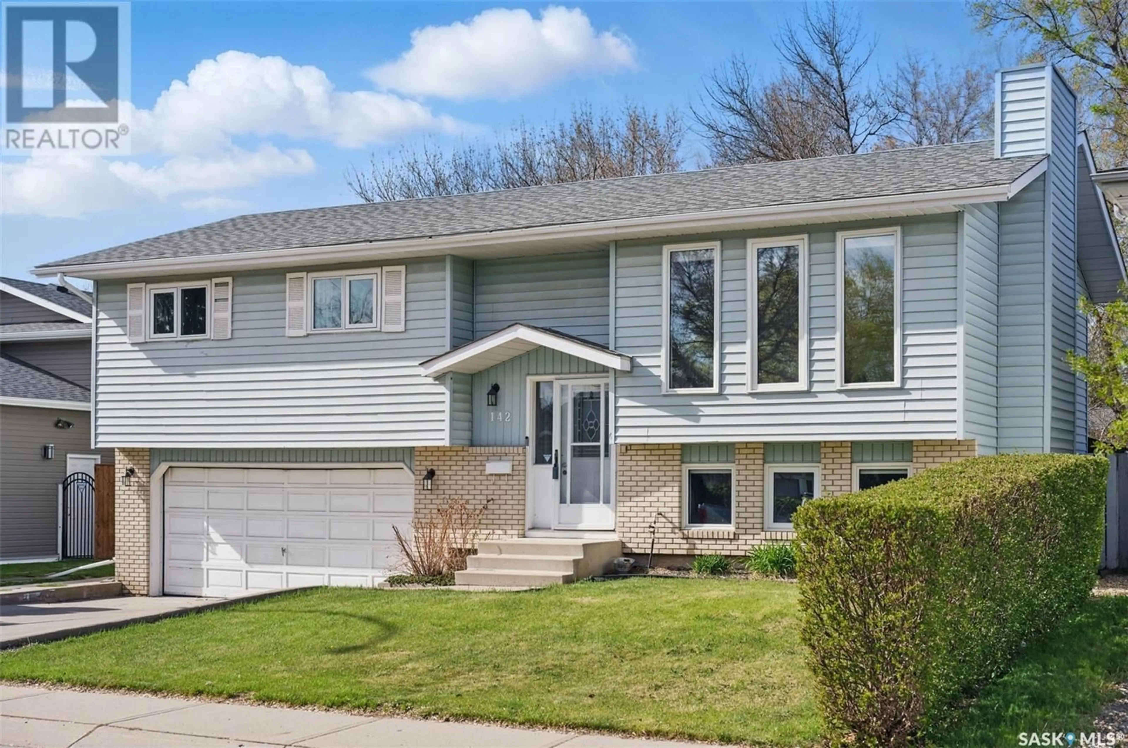 Home with vinyl exterior material, street for 142 STAIGH CRESCENT, Saskatoon Saskatchewan S7N3T3