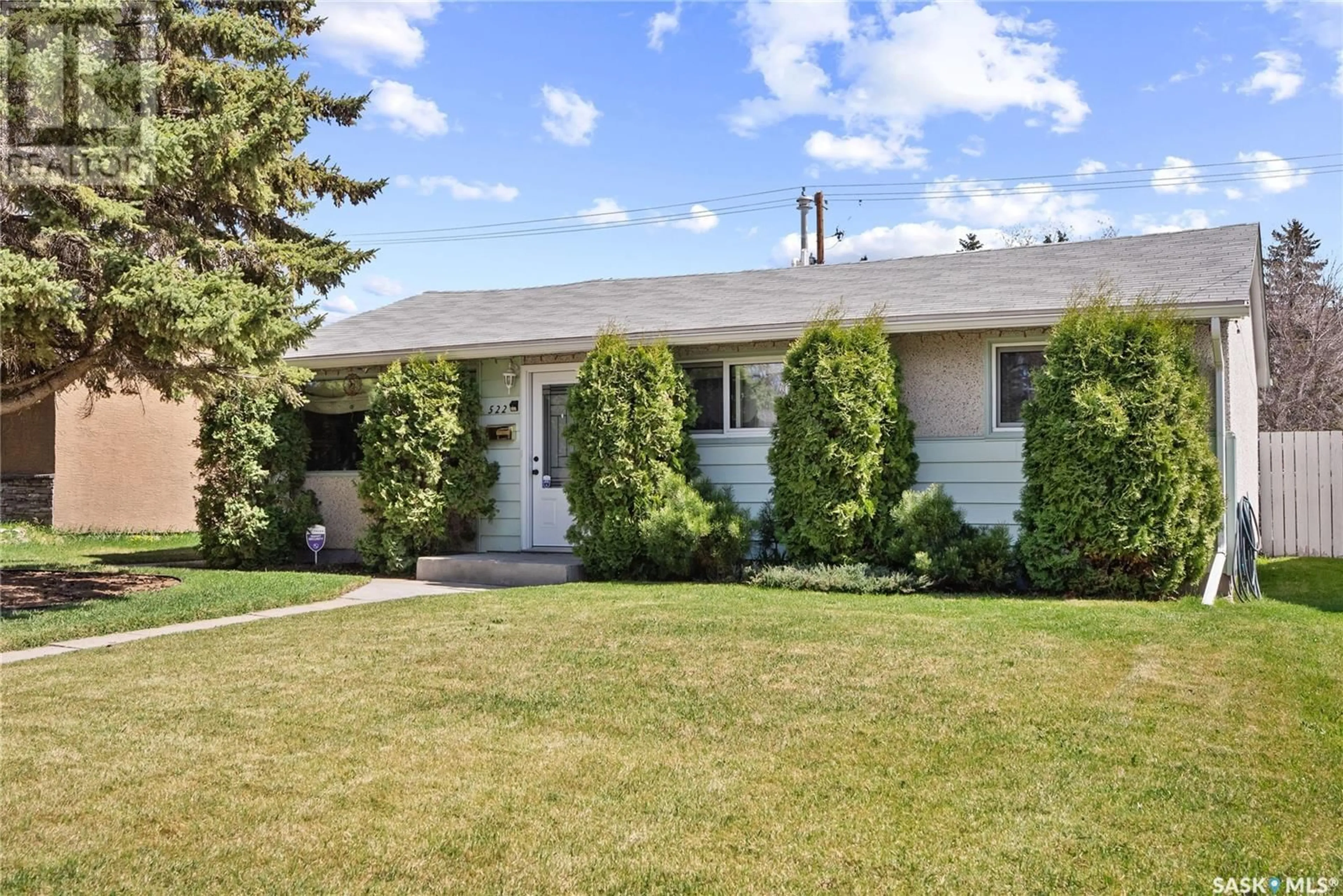 Home with vinyl exterior material, street for 522 U AVENUE, Saskatoon Saskatchewan S7M3C7