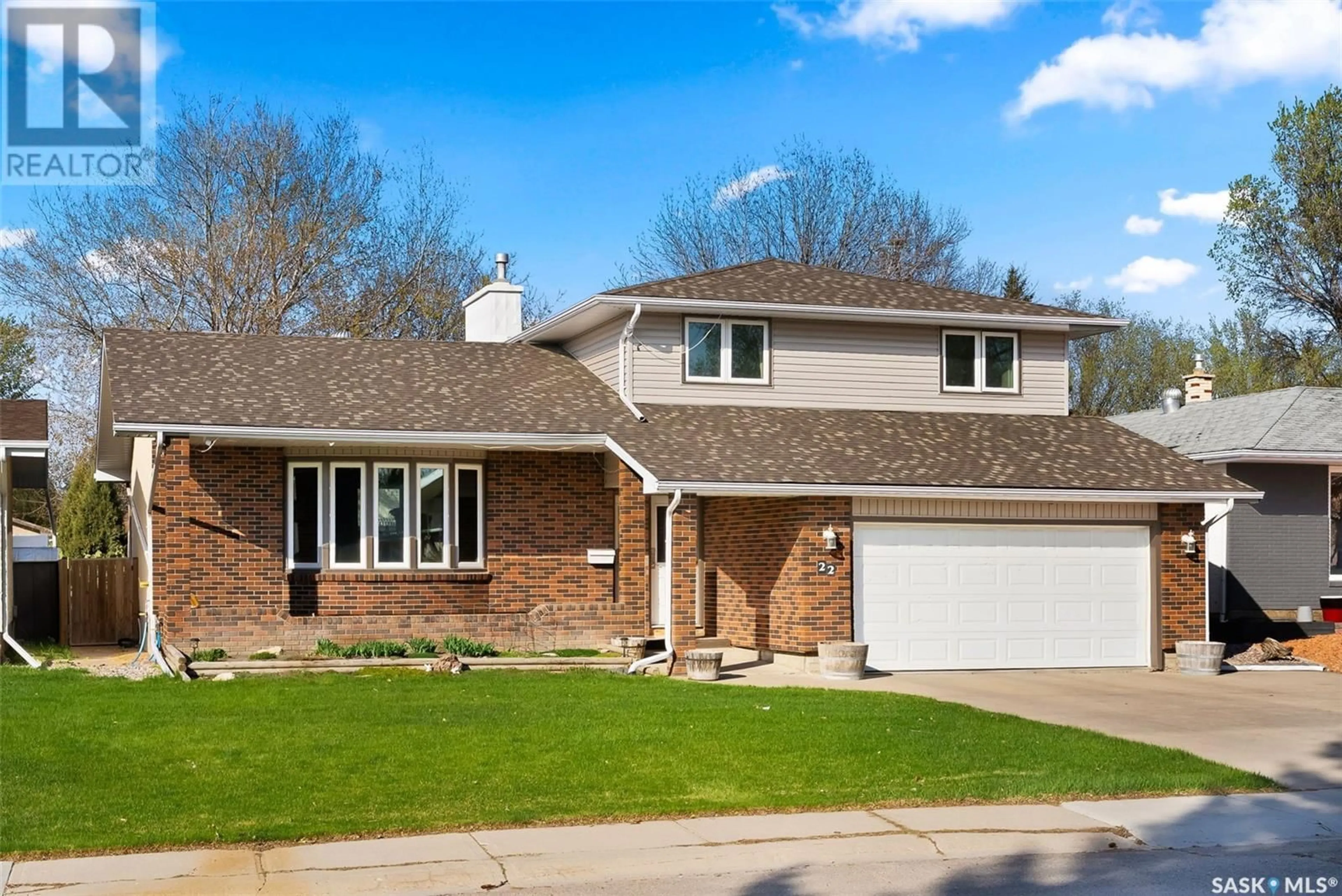 Home with brick exterior material, street for 22 DALHOUSIE WAY, Regina Saskatchewan S4V0A2