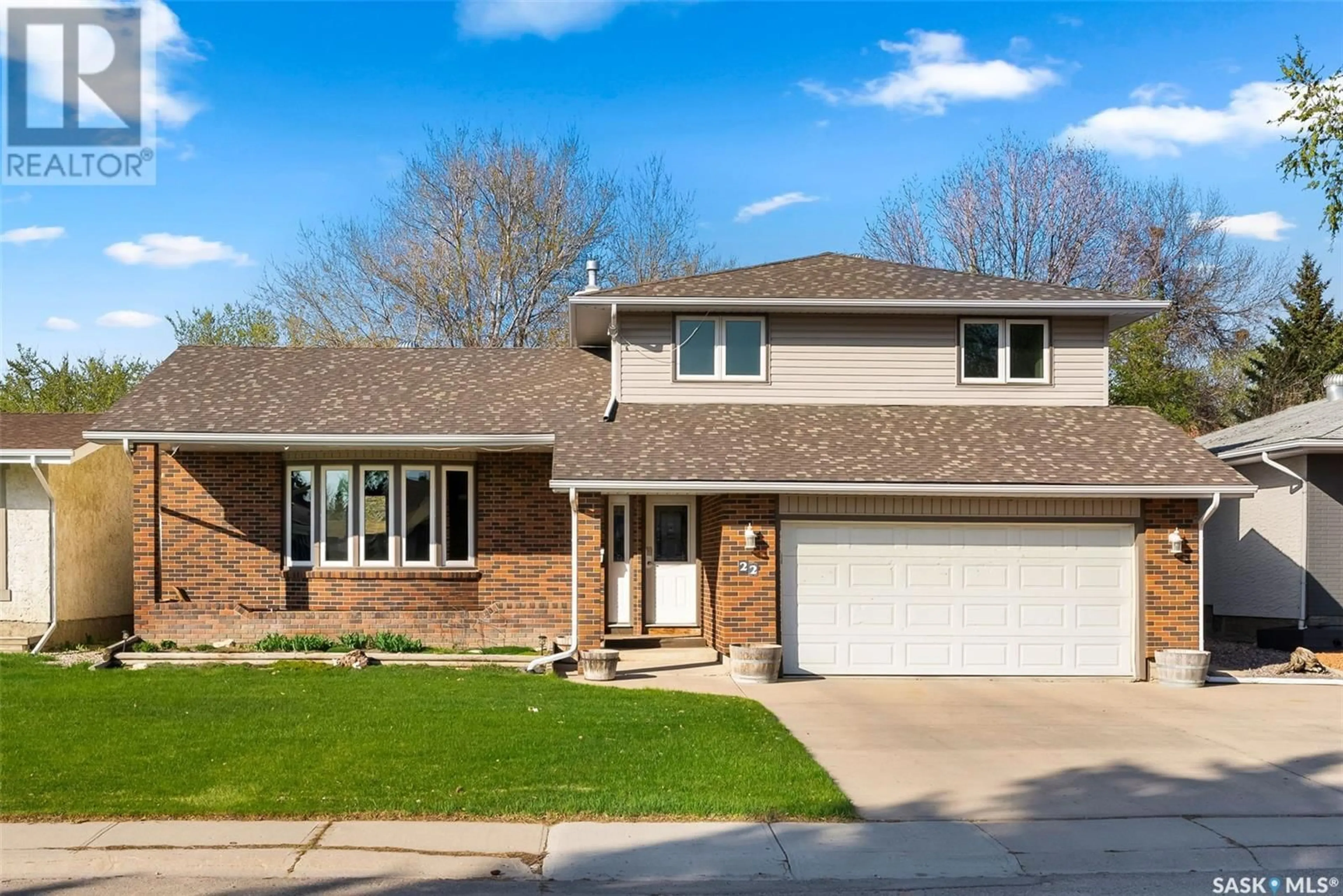 Home with brick exterior material, street for 22 DALHOUSIE WAY, Regina Saskatchewan S4V0A2