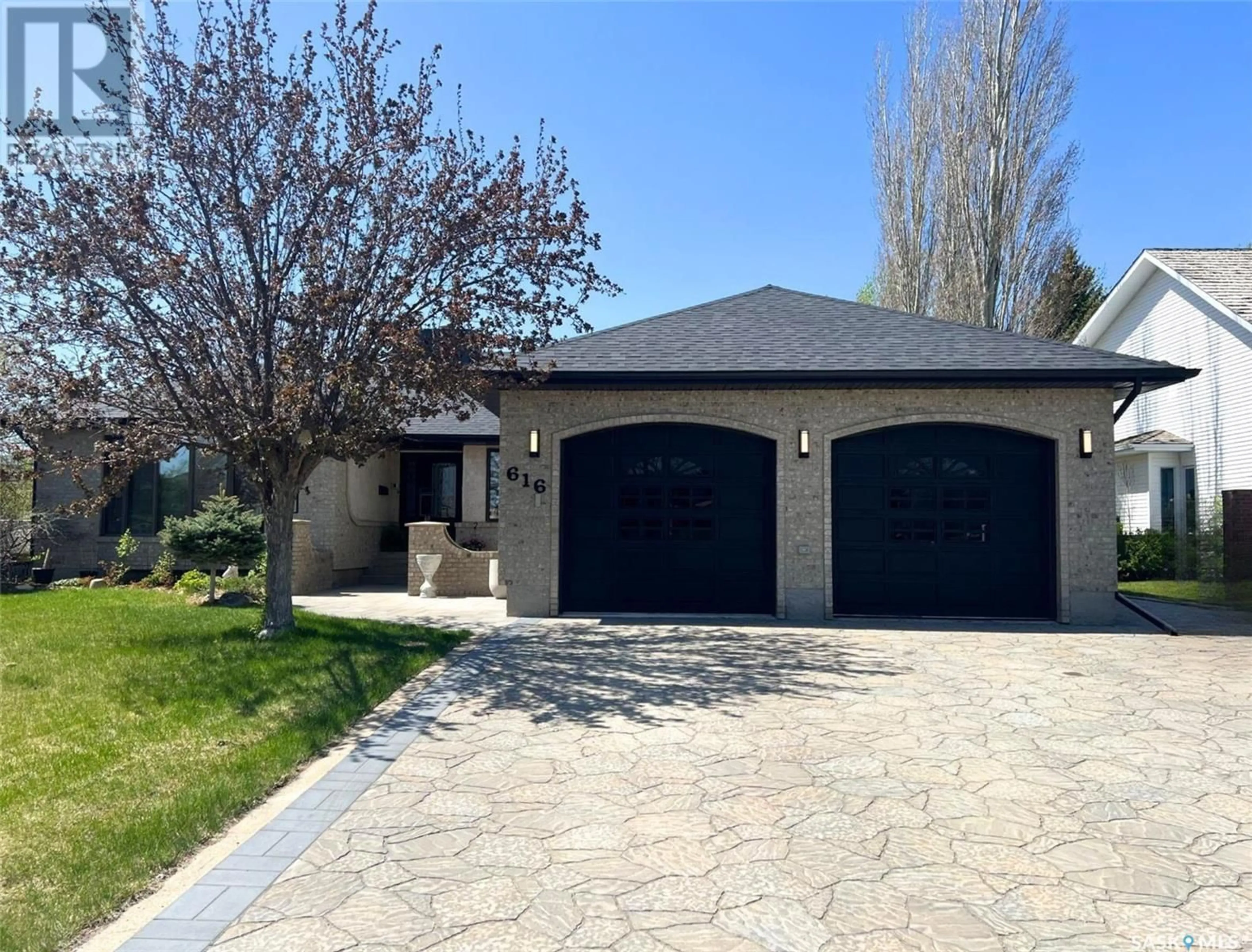 Home with brick exterior material, street for 616 HIGHLAND PLACE, Swift Current Saskatchewan S9H4Z5