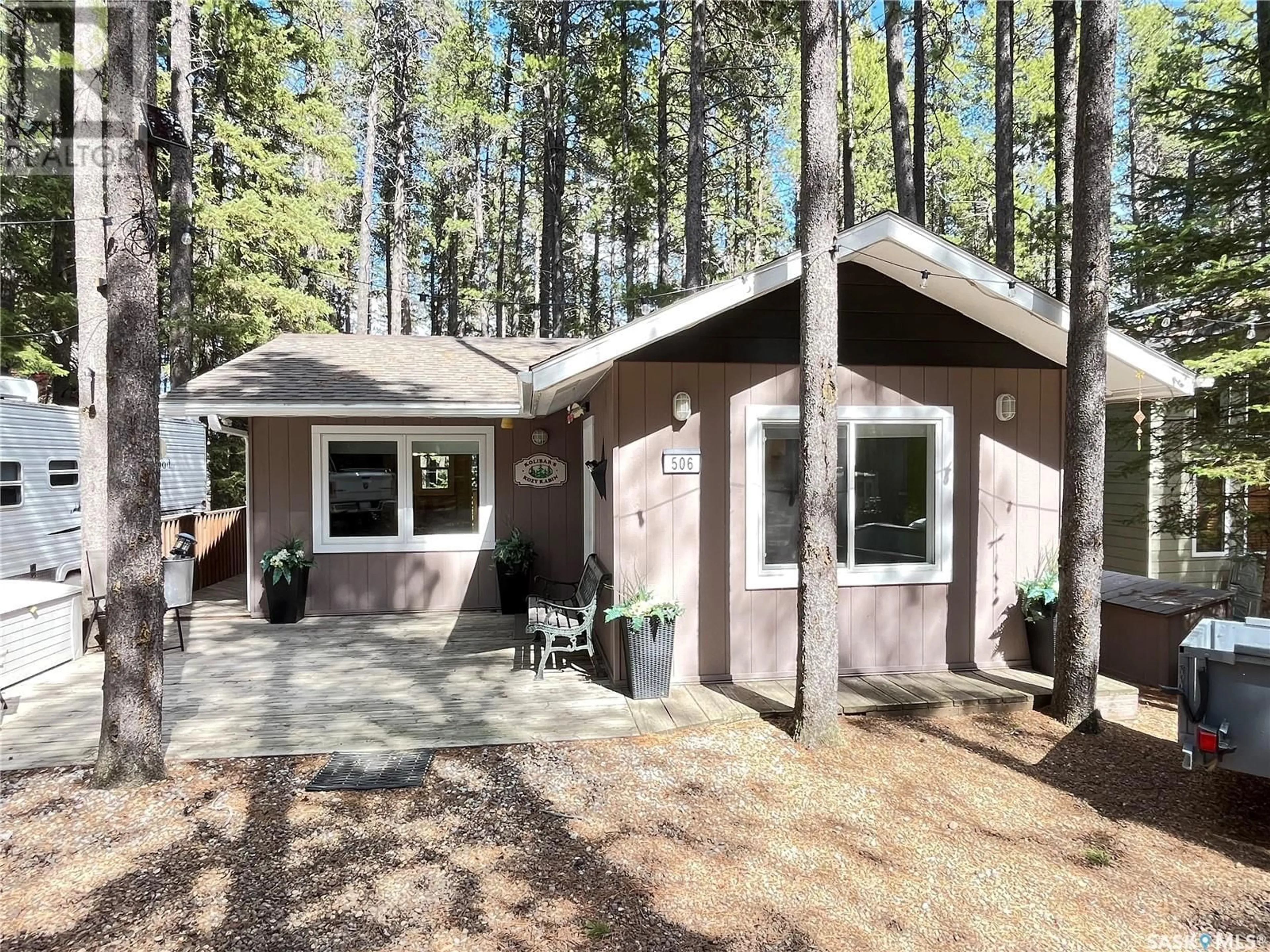 Home with vinyl exterior material, forest/trees view for 506 BELANGER DRIVE, Cypress Hills Provincial Park Saskatchewan S0N1N0